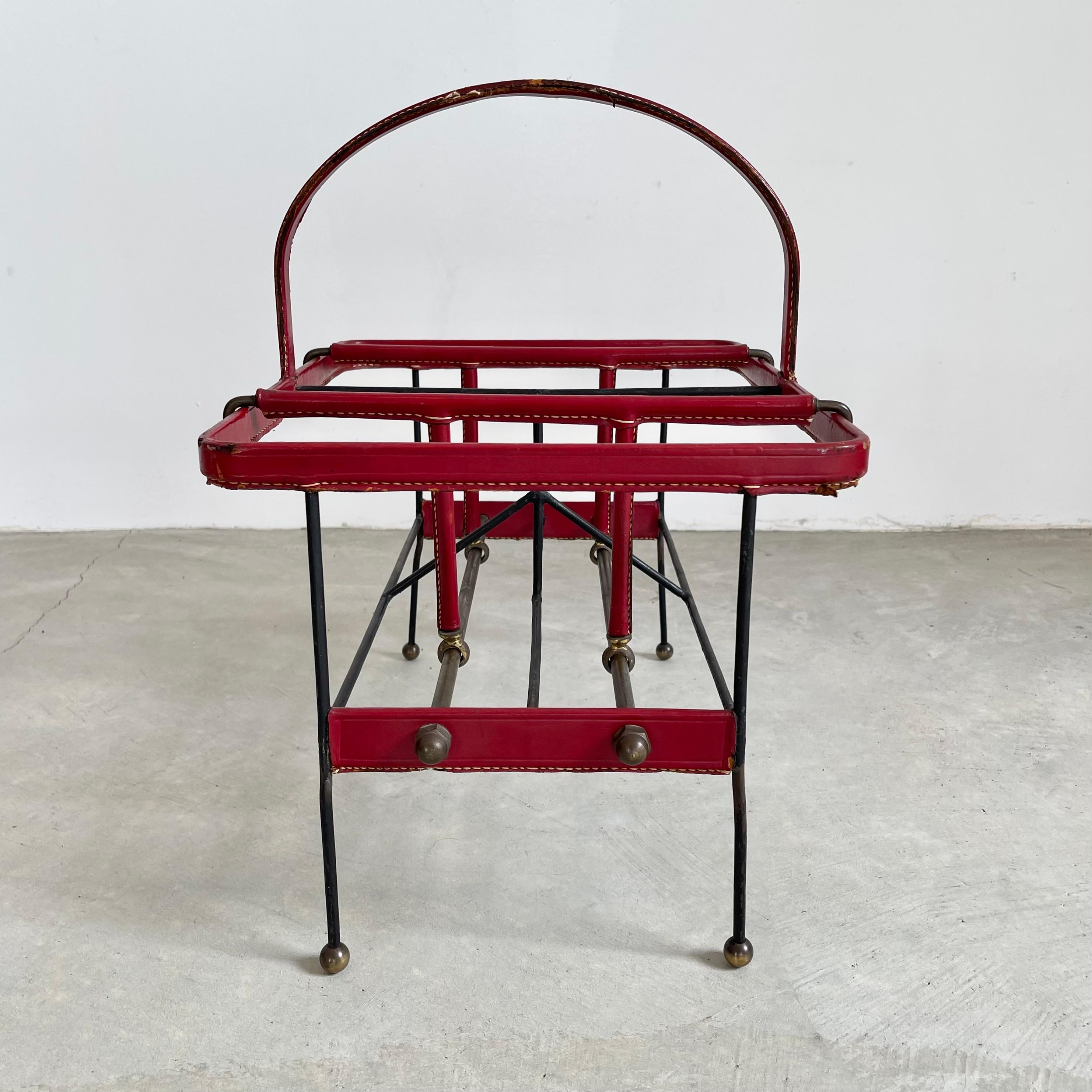 French Jacques Adnet Red Leather and Metal Book Rack, 1950s For Sale