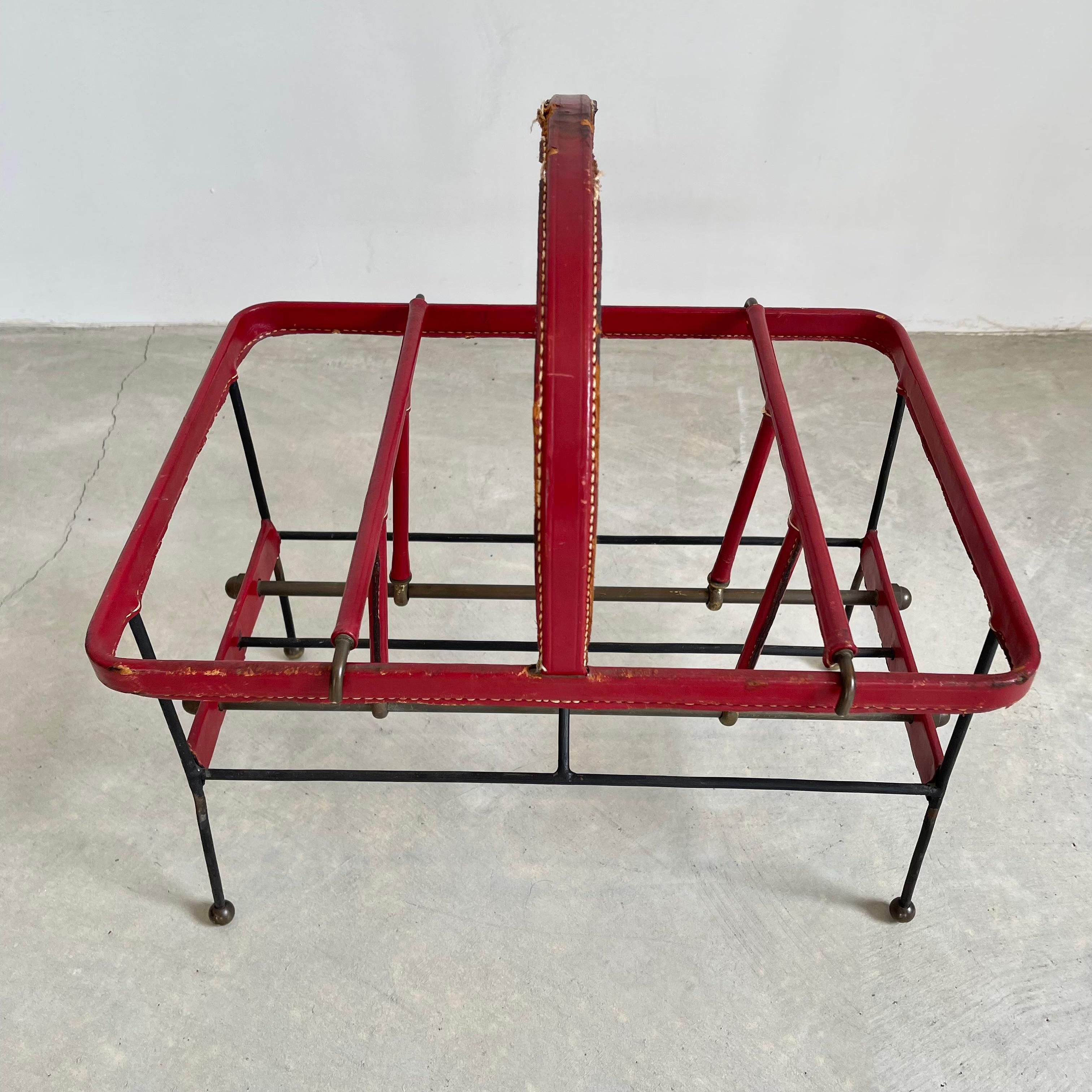 Jacques Adnet Red Leather and Metal Book Rack, 1950s In Good Condition For Sale In Los Angeles, CA