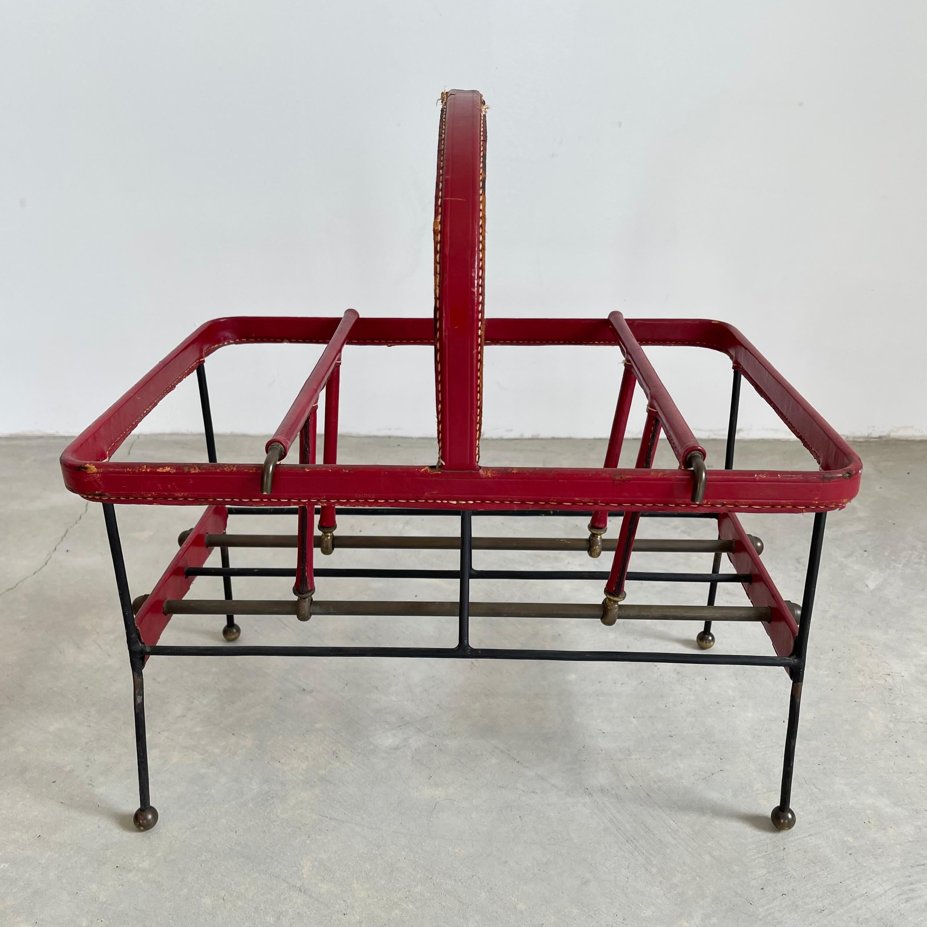 Mid-20th Century Jacques Adnet Red Leather and Metal Book Rack, 1950s For Sale