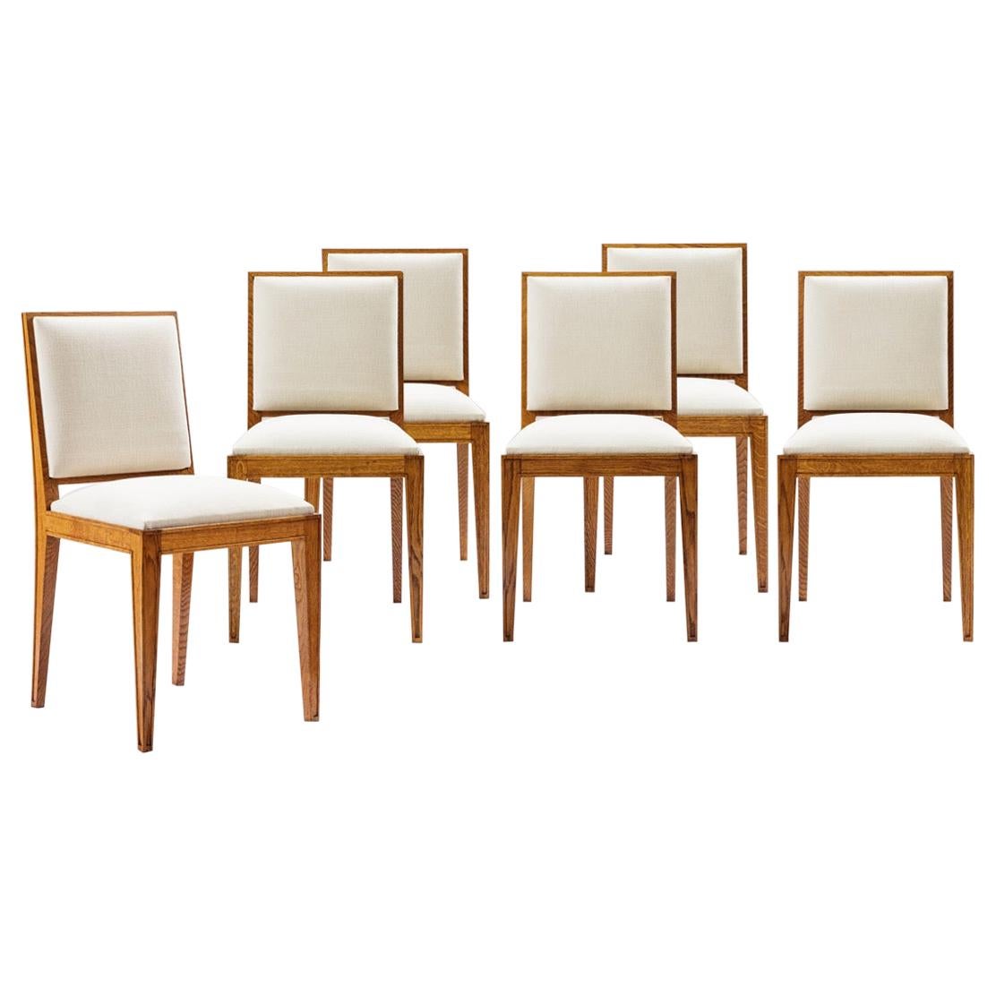 Jacques Adnet, Set of Six Oak Chairs, circa 1950