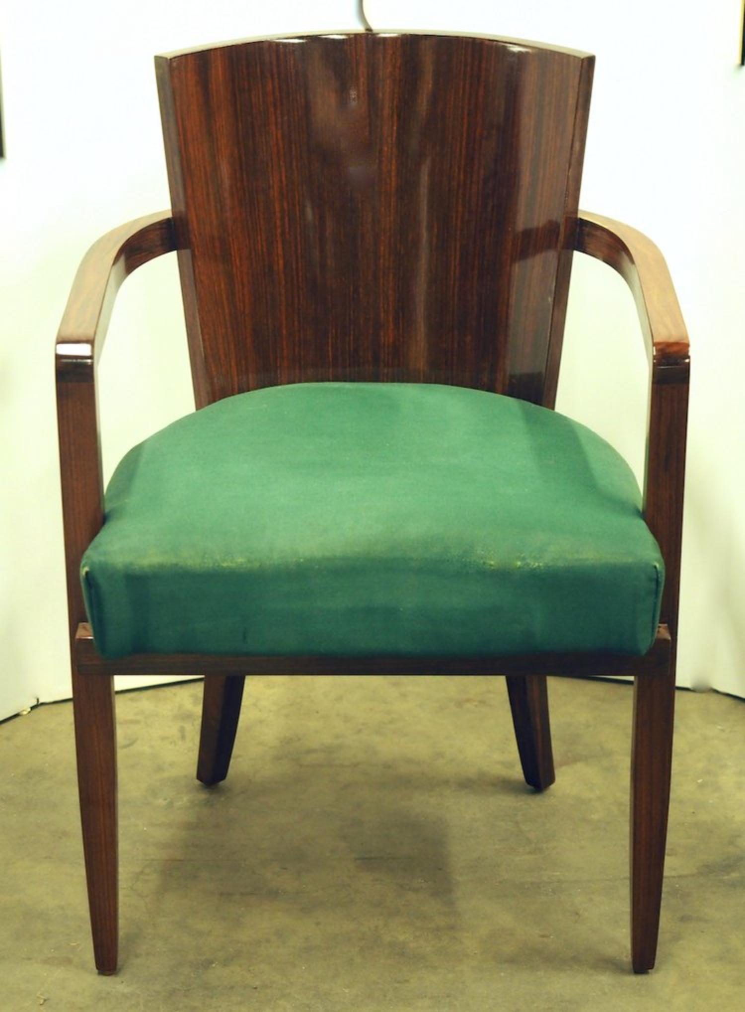 French Modernist Art Deco set of six armchairs by Jacques Adnet in rosewood, circa 1935. 24” wide x 26” deep x 30” high. Restored, refinished. Need new upholstery.

JACQUES ADNET

(1900-1984)

An icon of luxurious French Modernism,JACQUES