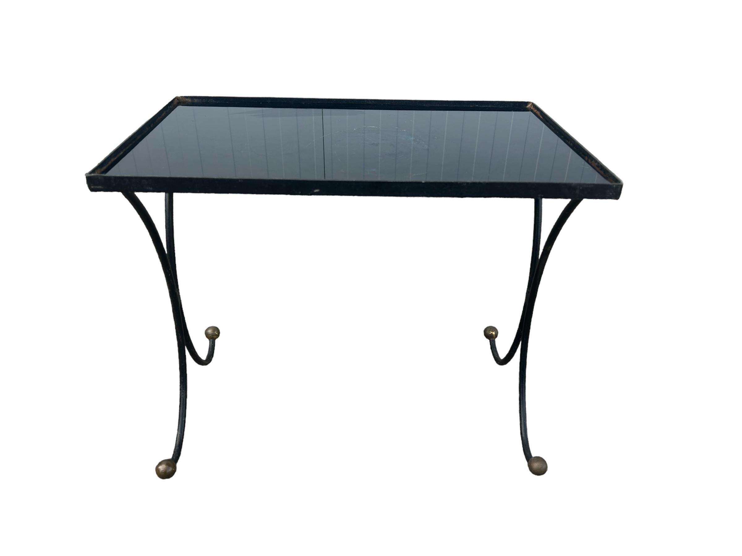 Modernist side table with lacquered metal base and black opaline on top , brass details at base 