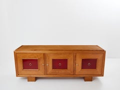 Jacques Adnet credenza in rovere massiccio laccato rosso 1940