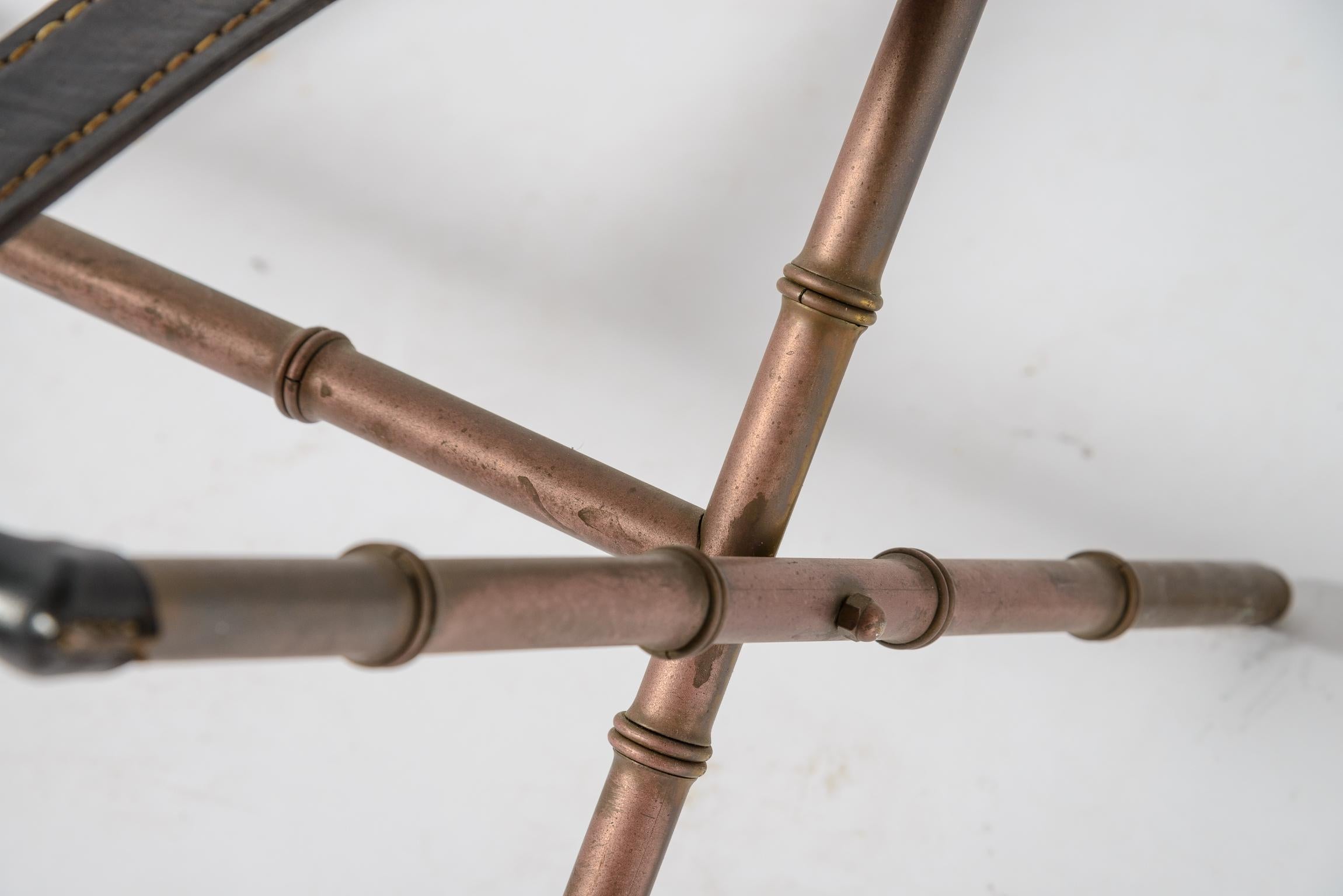 Jacques Adnet Stitched Leather and Brass Luggage Stand In Good Condition For Sale In West Palm Beach, FL