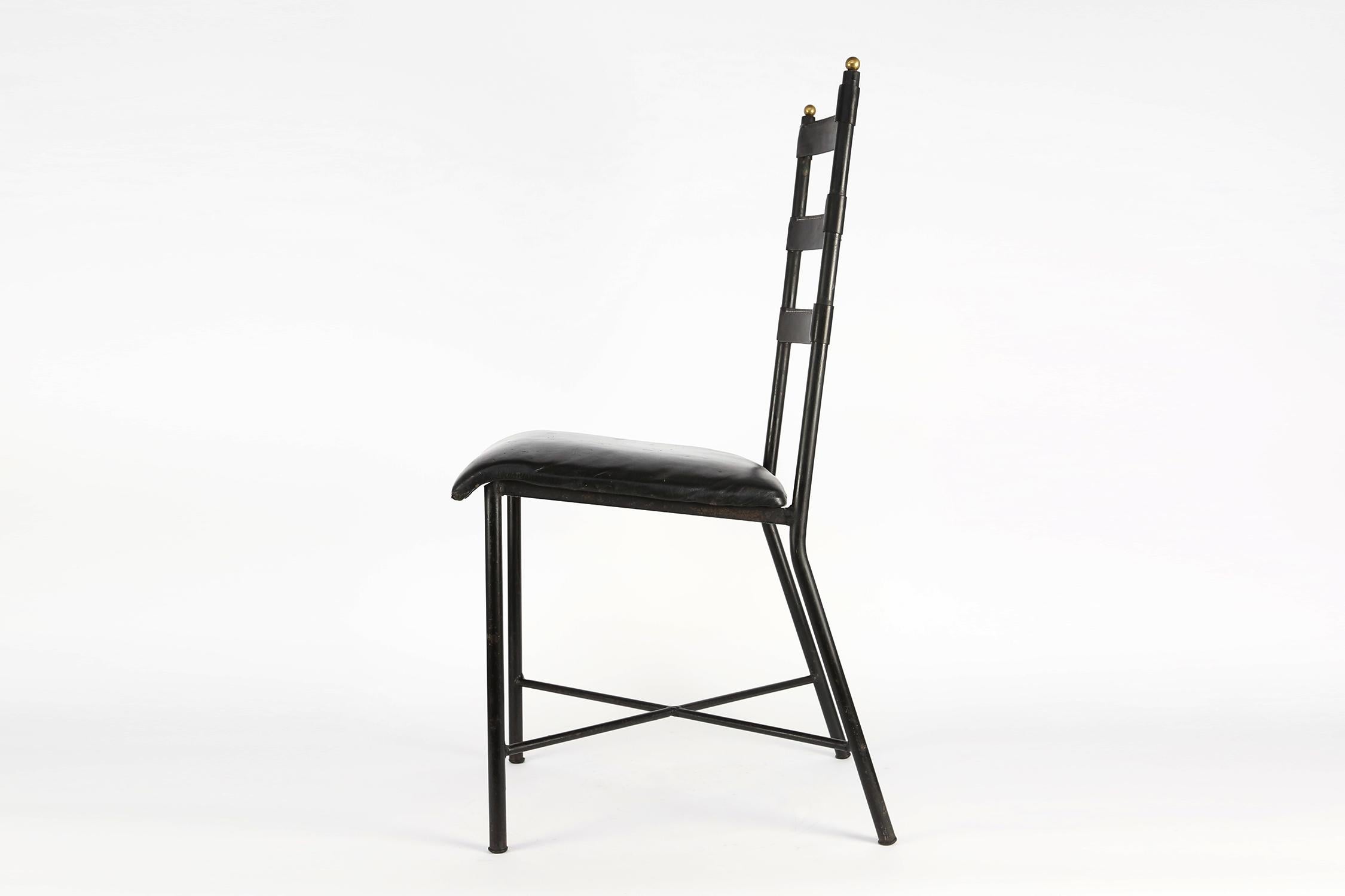 Side chair by French designer Jacques Adnet.
Black lacquered metal frame with brass details with stitched black leather seat and backrest,
circa 1960s.
Great patina.