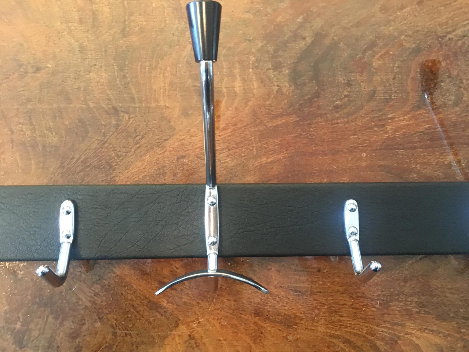 French Jacques Adnet Style Black Leather Coat Rack Hanger, France, 1950s For Sale