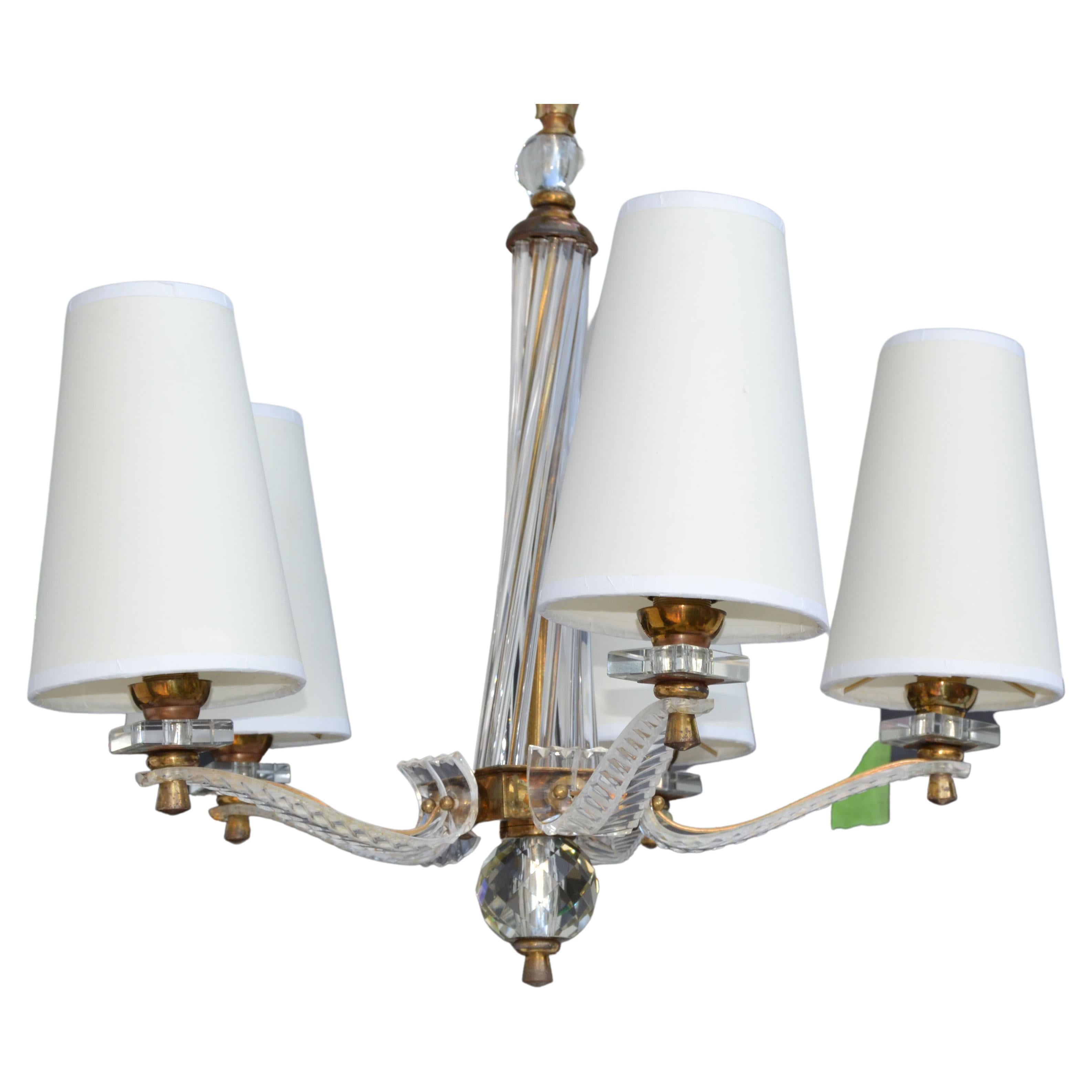 5 Light chandelier of brass, Lucite and blown glass rods designed by Maison Jansen. 
The cone off-white shades are included.
Working condition and takes 5 max. 60 watts light bulb.
Cone Shade measure:
Top diameter: 3, bottom diameter 5 inches,