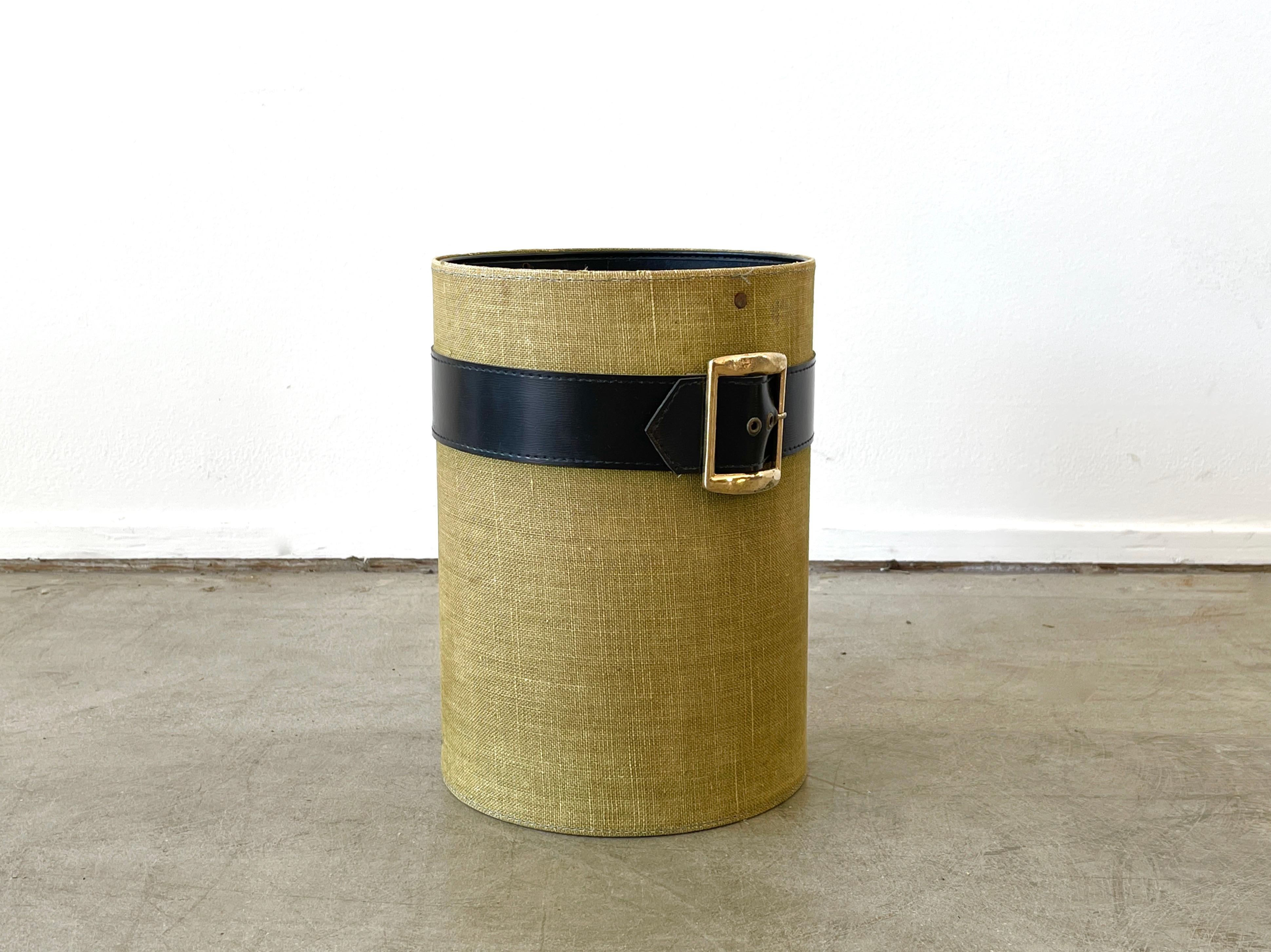 Handsome waste bin attributed to Jacques Adnet with woven fabric and leather strap/buckle.
