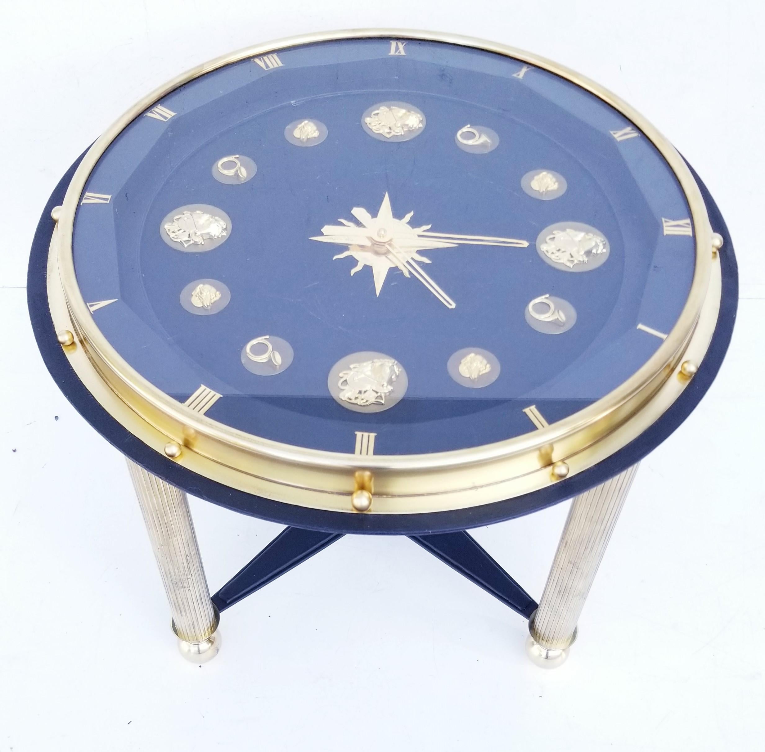 Jacques Adnet style French clock table, circa 1950, animals and music instrument décor, see pictures
Unusual piece, bronze, brass and faux leather.