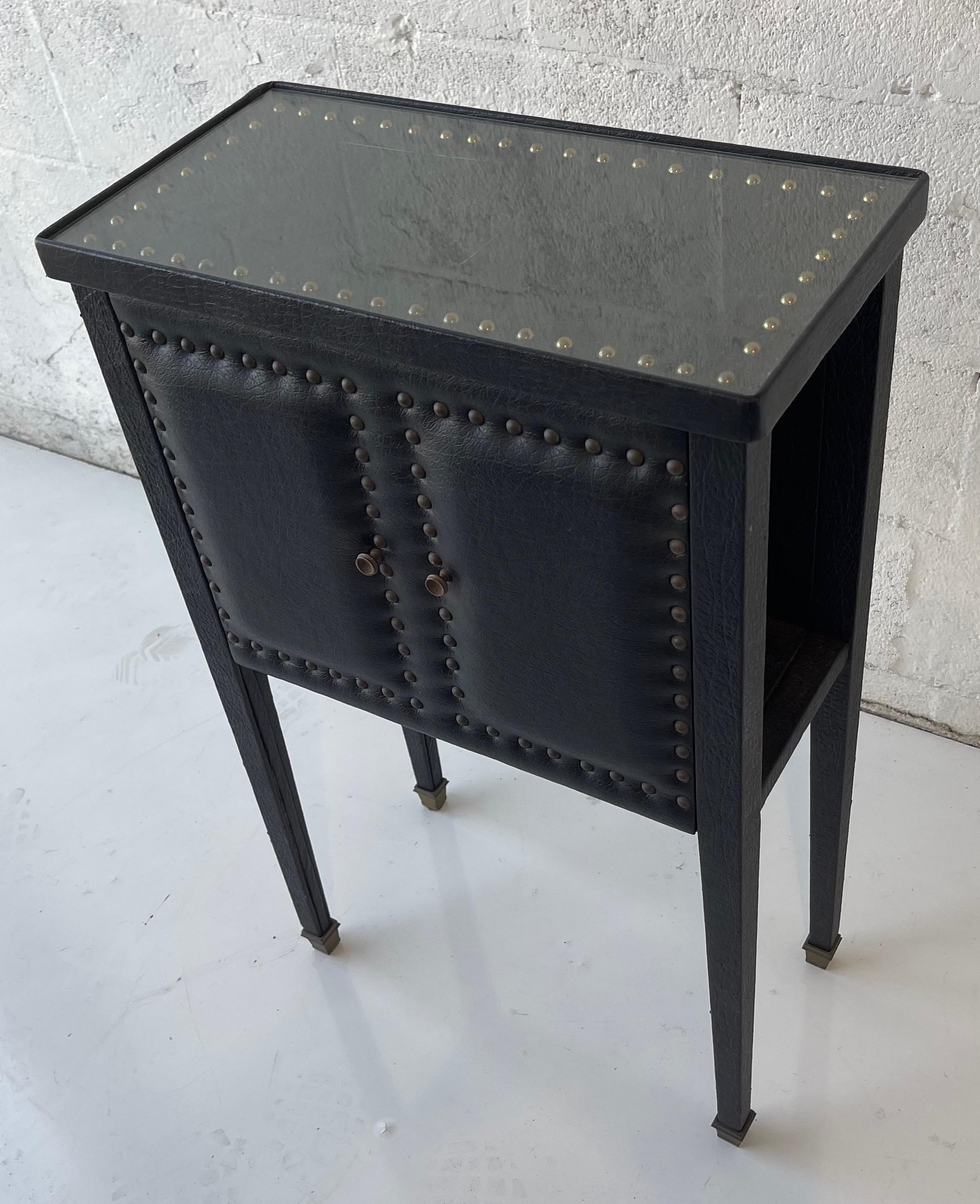 Jacques Adnet Style French faux leather side table, circa 1950.
Fake door, all faces faux leather finished.