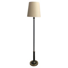 Lampadaire en cuir et laiton de style Jacques Adnet