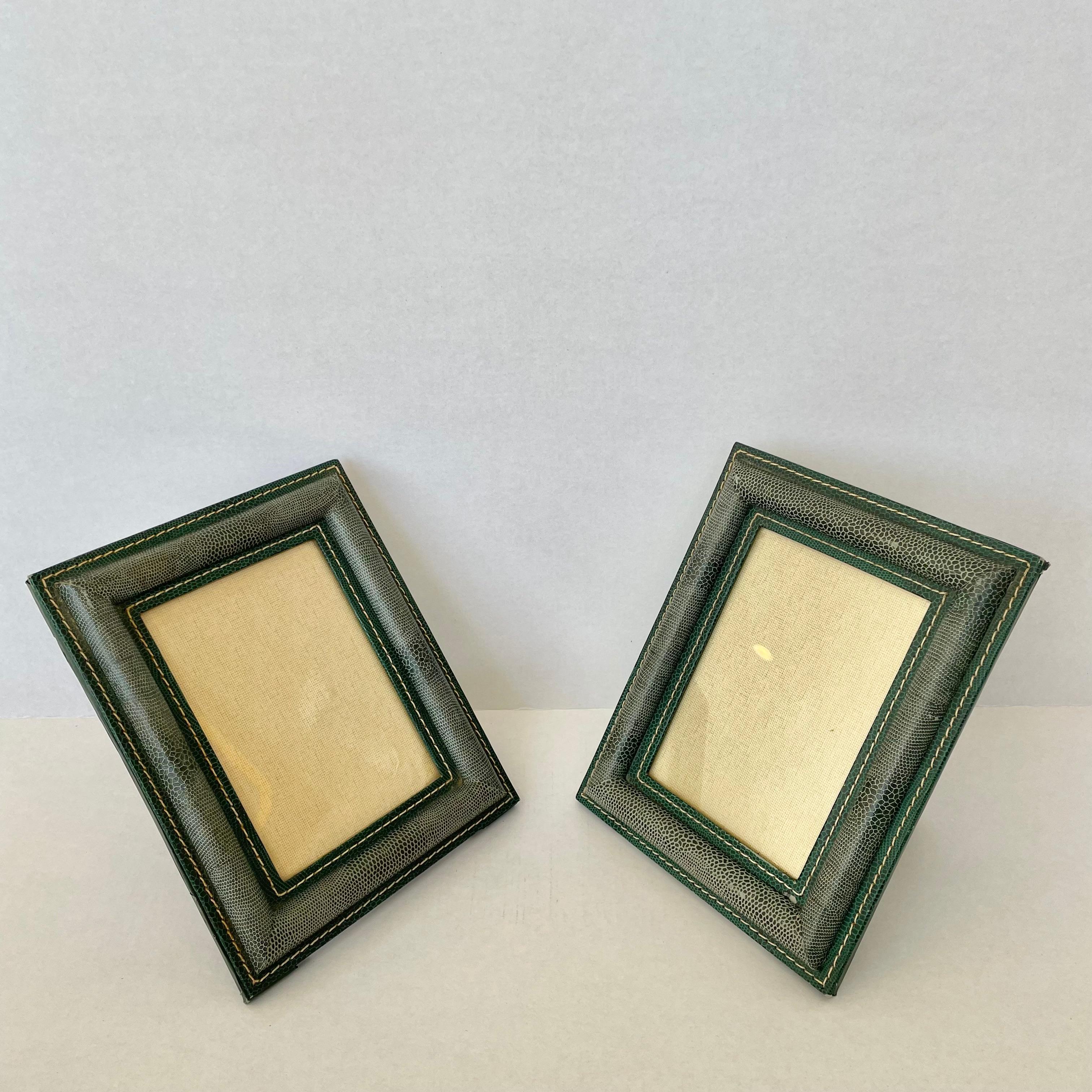 Classic French leather picture frame in the style of Jacques Adnet. Green leather with signature Adnet contrast stitching. Very good vintage condition. Great patina and age to leather. Priced individually. 

  