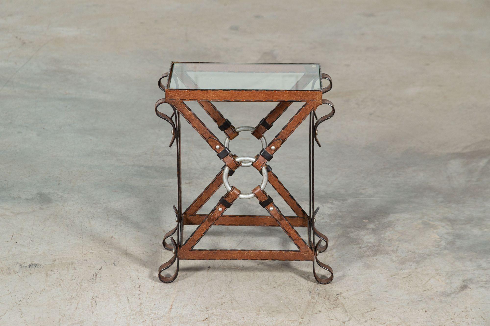 circa Mid-20th century
Jacques Adnet Style Iron Leather Side Table
W40 x D21 x H46 cm.