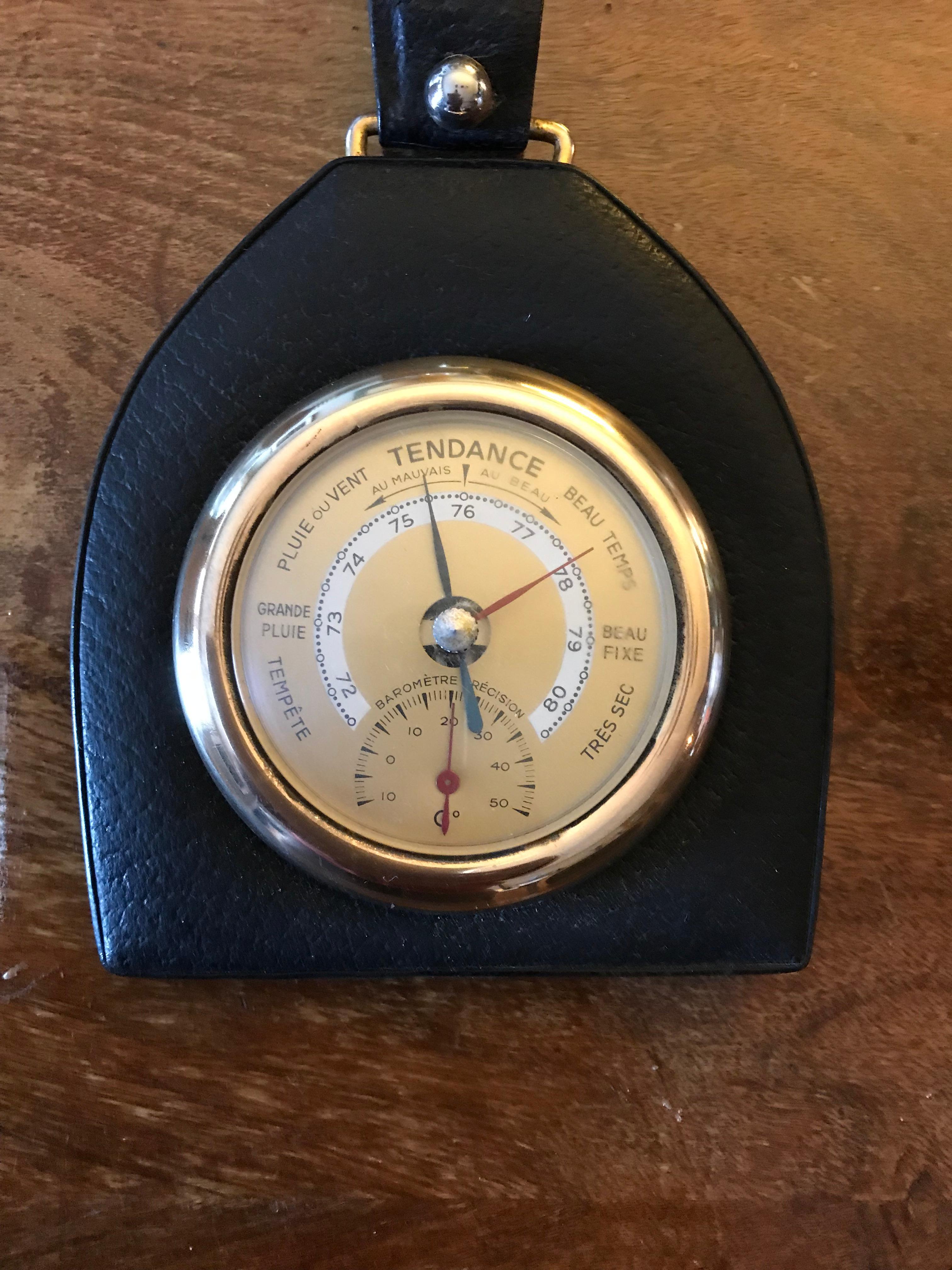 Jacques Adnet style Mid-Century Modern leather barometer, France 1950s
In a very good general condition.

     
      