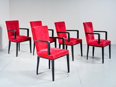 Jacques Adnet, Suite of Five Armchairs in Blackened Wood and Red Velvet, circa 1