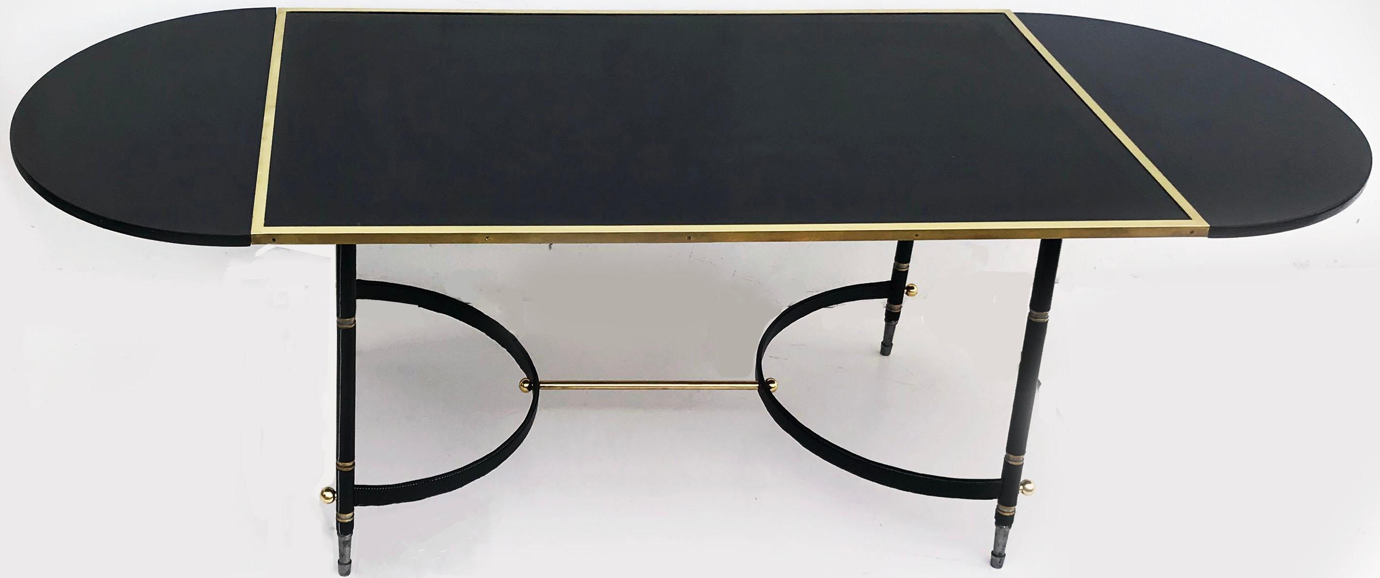 Superb Art Deco Jacques Adnet Dining Table or Desk made out of Steel, Brass and Leather.
Newly restored, 2 additional leaves available.
Stunning French Craftsmanship. 