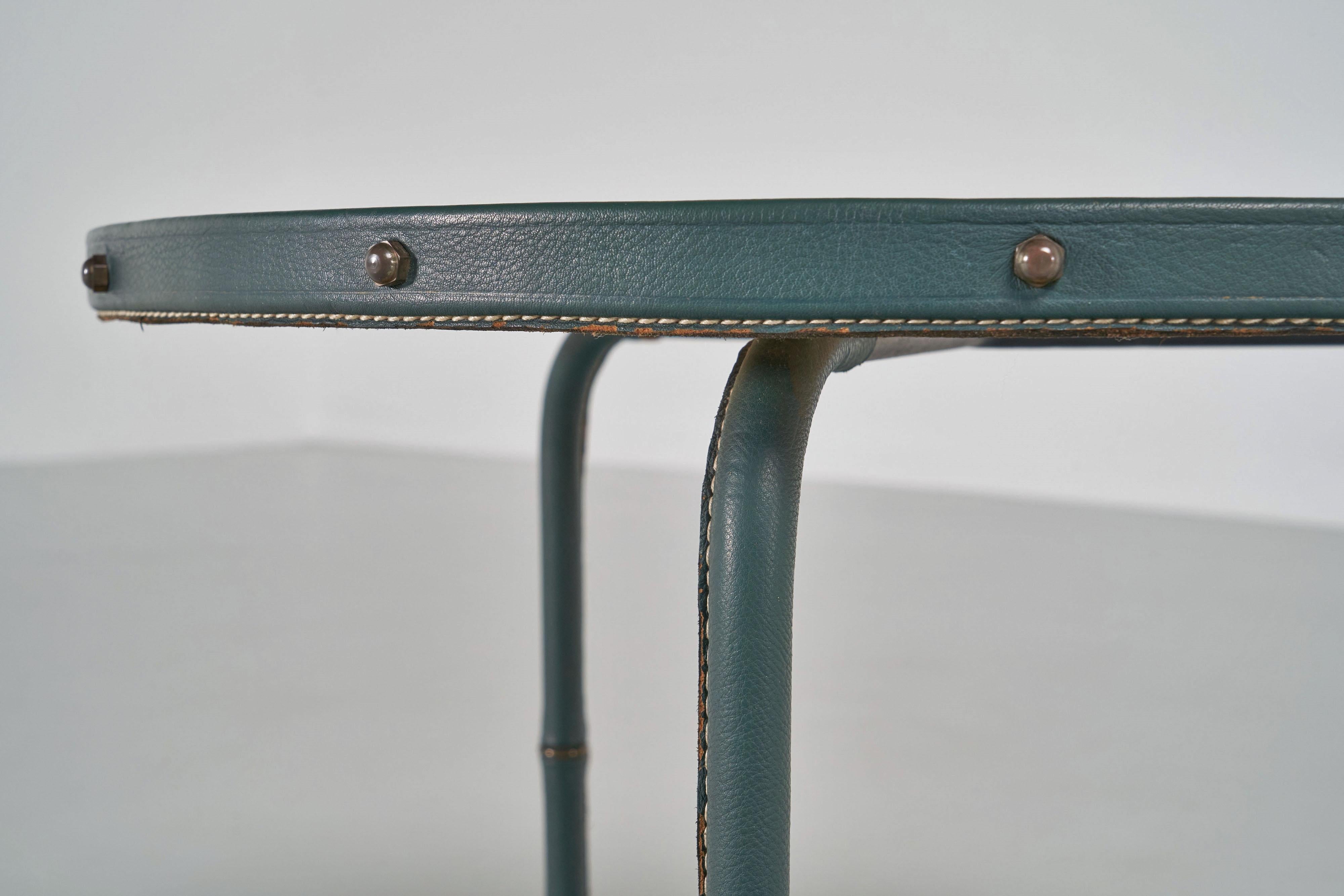 Brass Jacques Adnet tripod table in leather France 1950