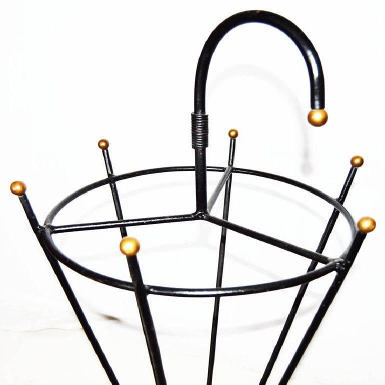Nice Jacques Adnet umbrella stand, iron and brass.