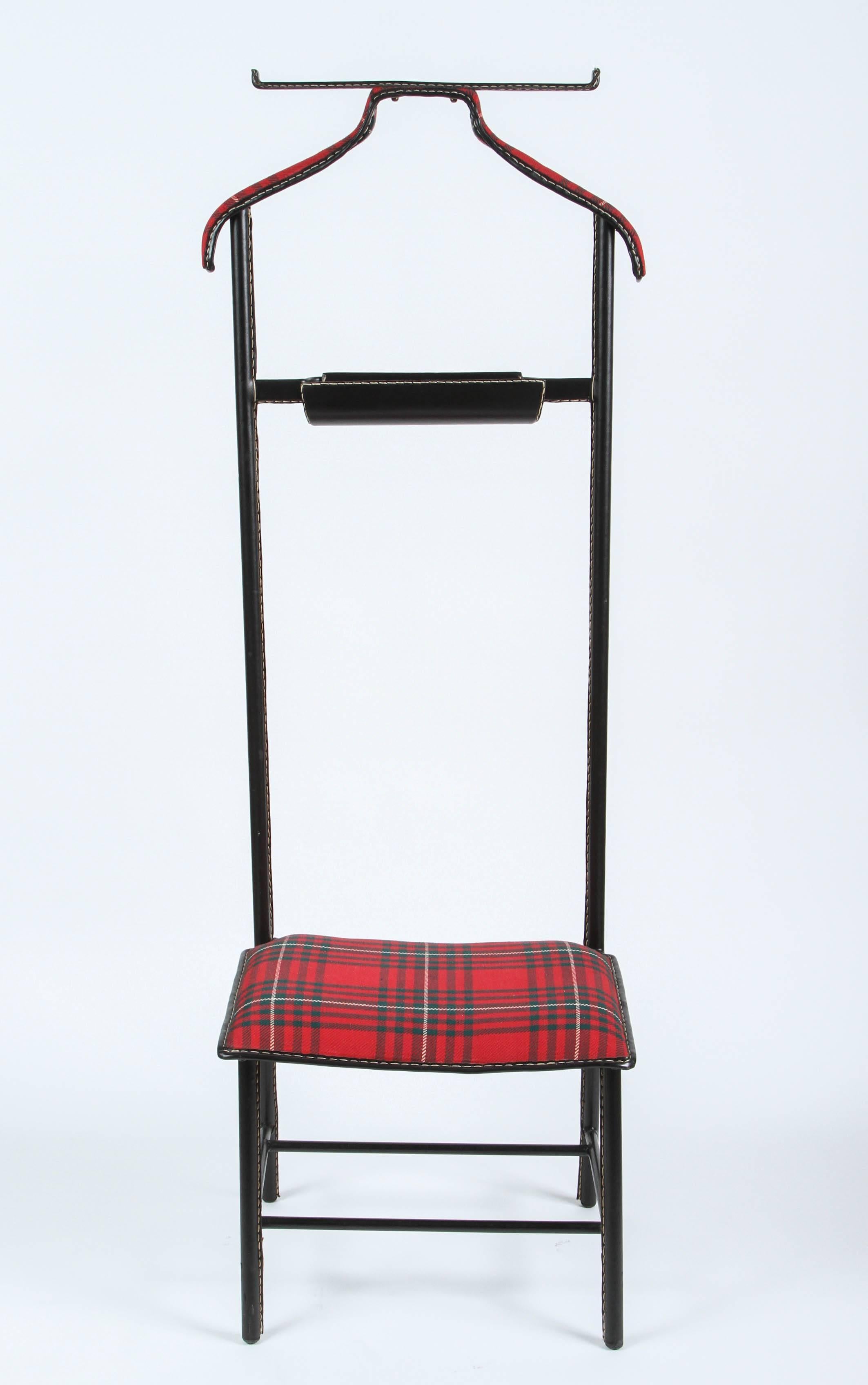 Rare Jacques Adnet for Hermes valet de nuit and seat with leather wrapped hand-stitched in Hermès saddle style and original tartan plaid wool upholstery.
Original Tartan fabric in excellent condition.
Valet features a coat stand, pant hanger, vide