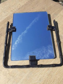 Jacques ADNET wall mirror in saddle stitched leather, brass spheres circa 1950