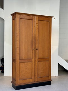 Jacques Adnet wardrobes in oak and formica circa 1950