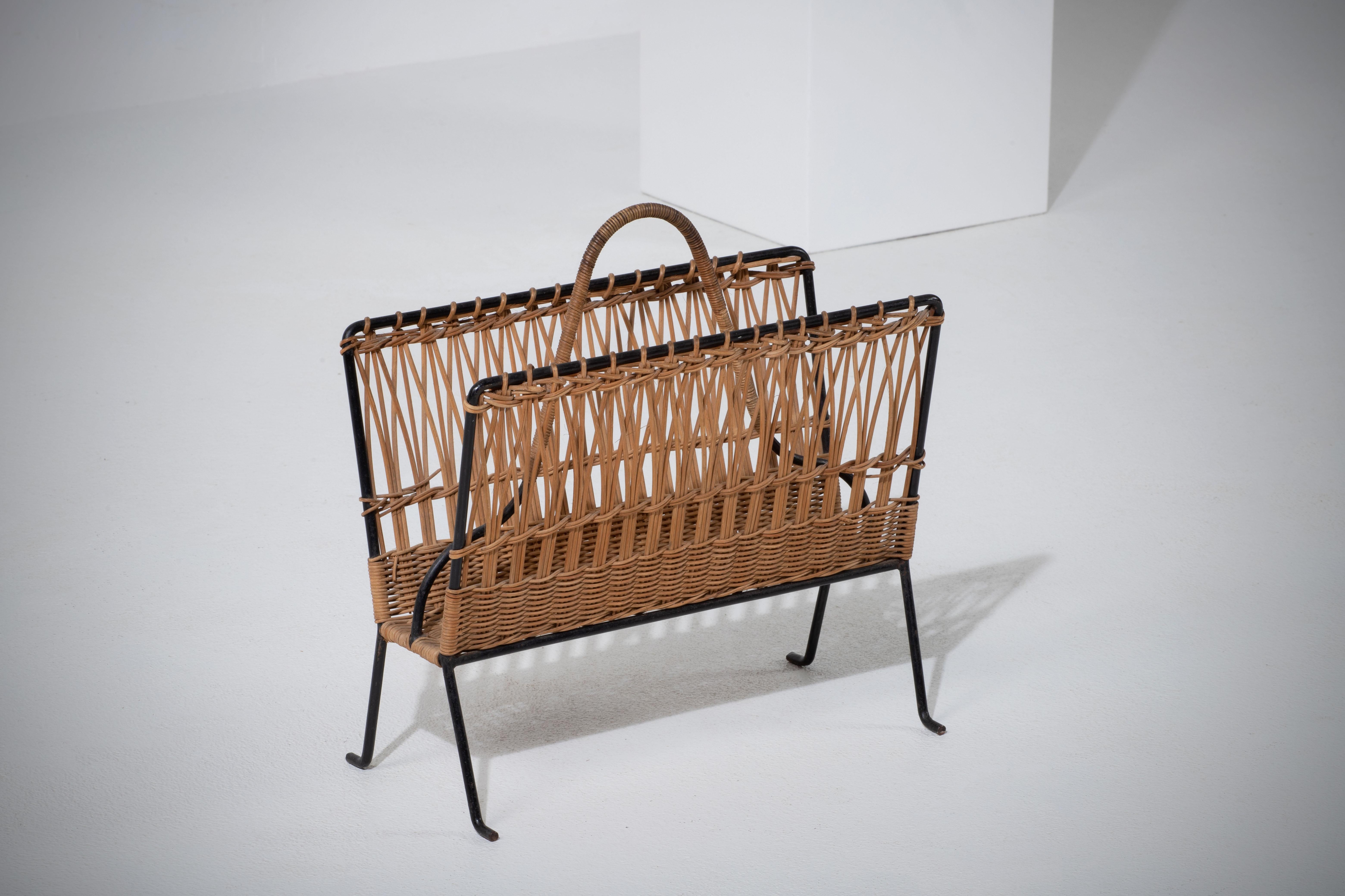 French Provincial Jacques Adnet Wicker Magazine Rack with Black Iron Frame, Brass Ball Feet, 1950s For Sale