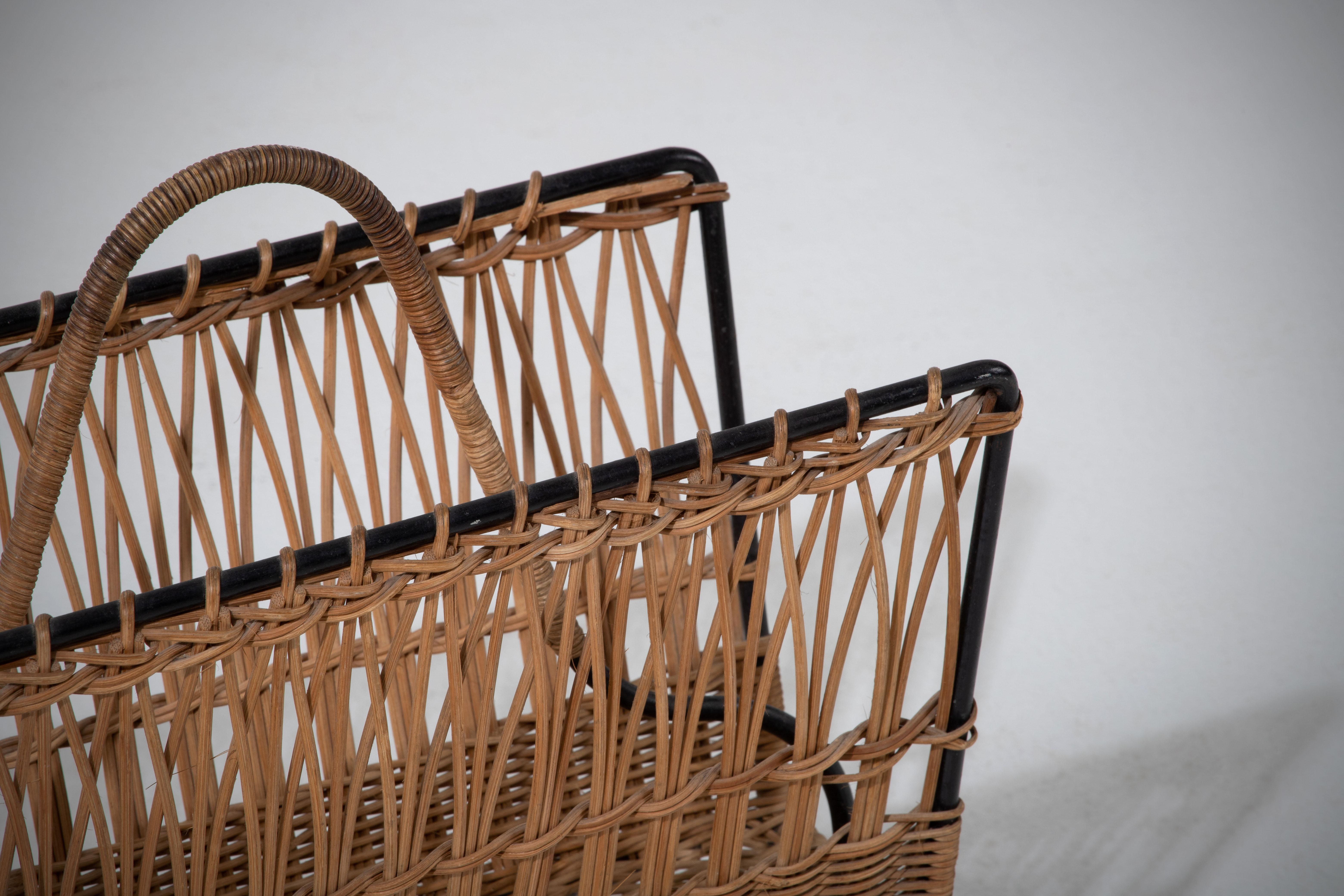 Mid-20th Century Jacques Adnet Wicker Magazine Rack with Black Iron Frame, Brass Ball Feet, 1950s For Sale
