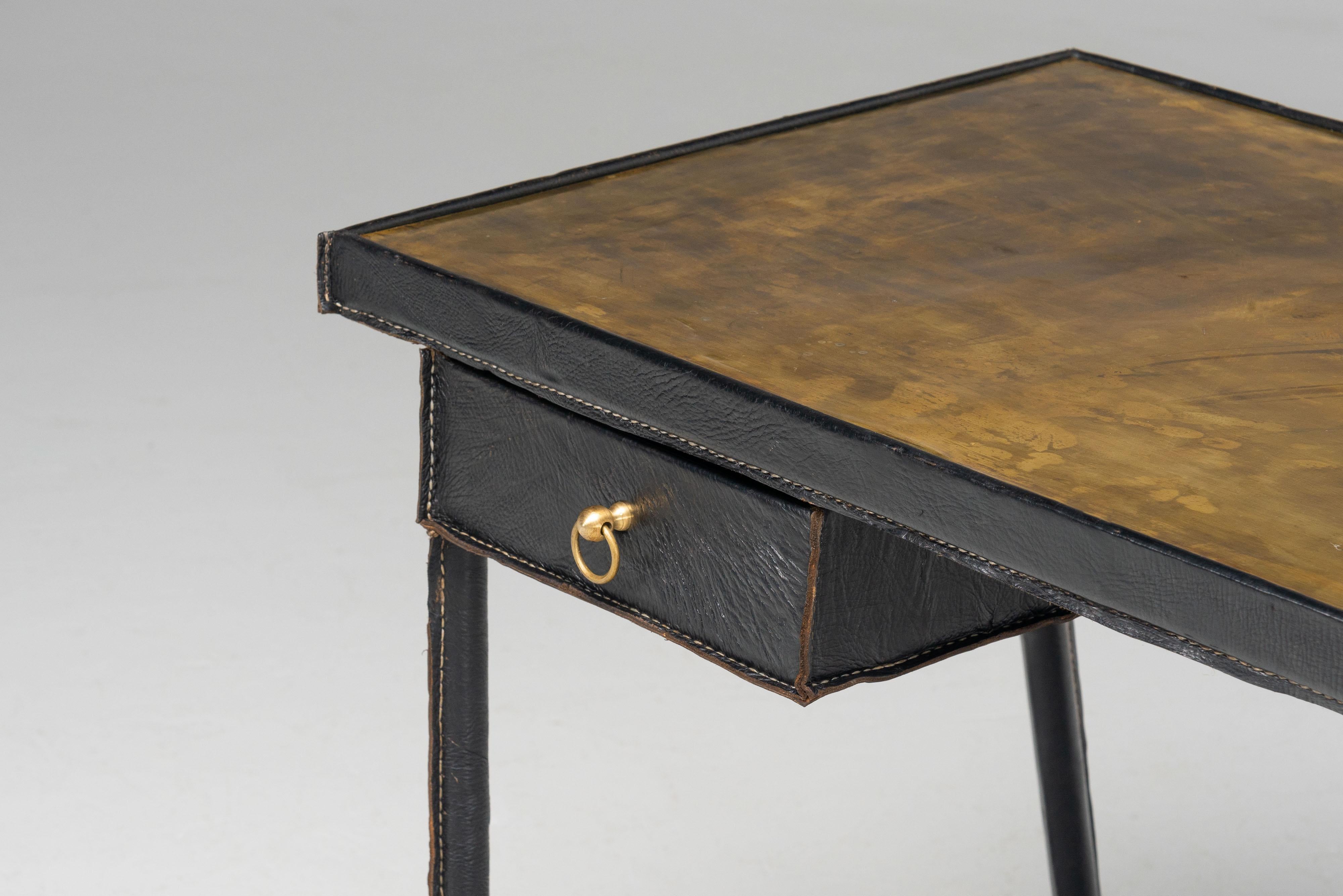 Brass Jacques Adnet writing desk in leather France 1950 For Sale