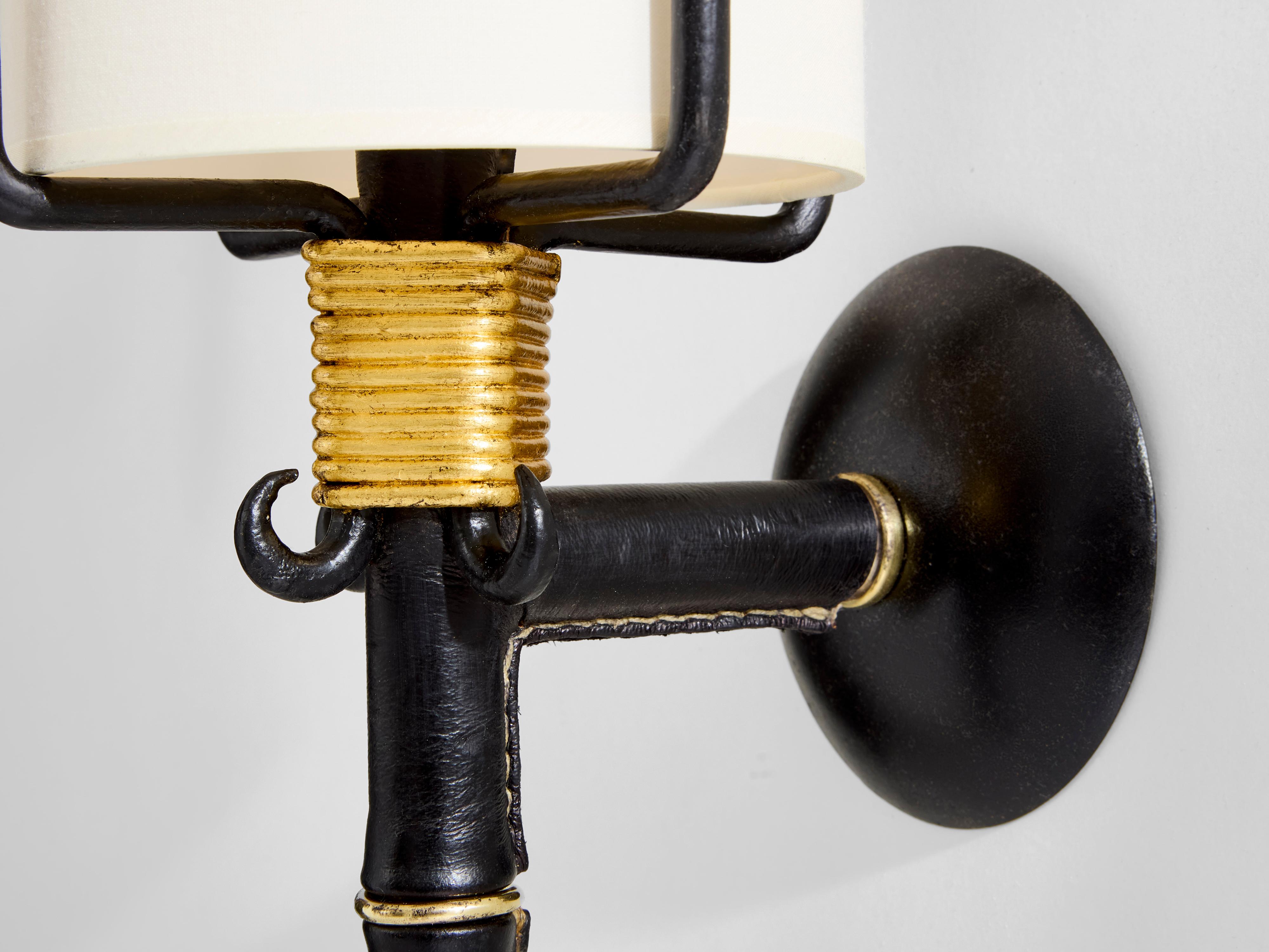 Mid-20th Century Jacques Adnet wrought iron leather and brass wall lights 1950