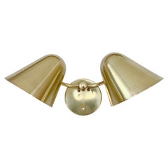 Jacques Biny Rara applique a due luci in ottone, 1950 circa, Francia.