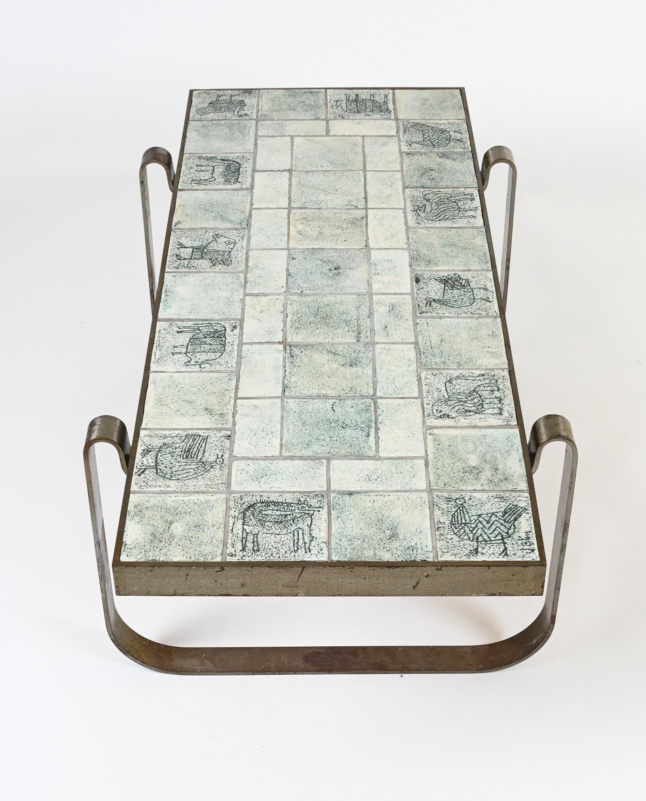 Rare modernist midcentury steel-framed low table composed of ceramic tiles of animals by Jacques Blin.
Jacques Blin, born in France in 1920 originally trained in engineering diploma. In 1954, choosing to follow his passion, he founded his own