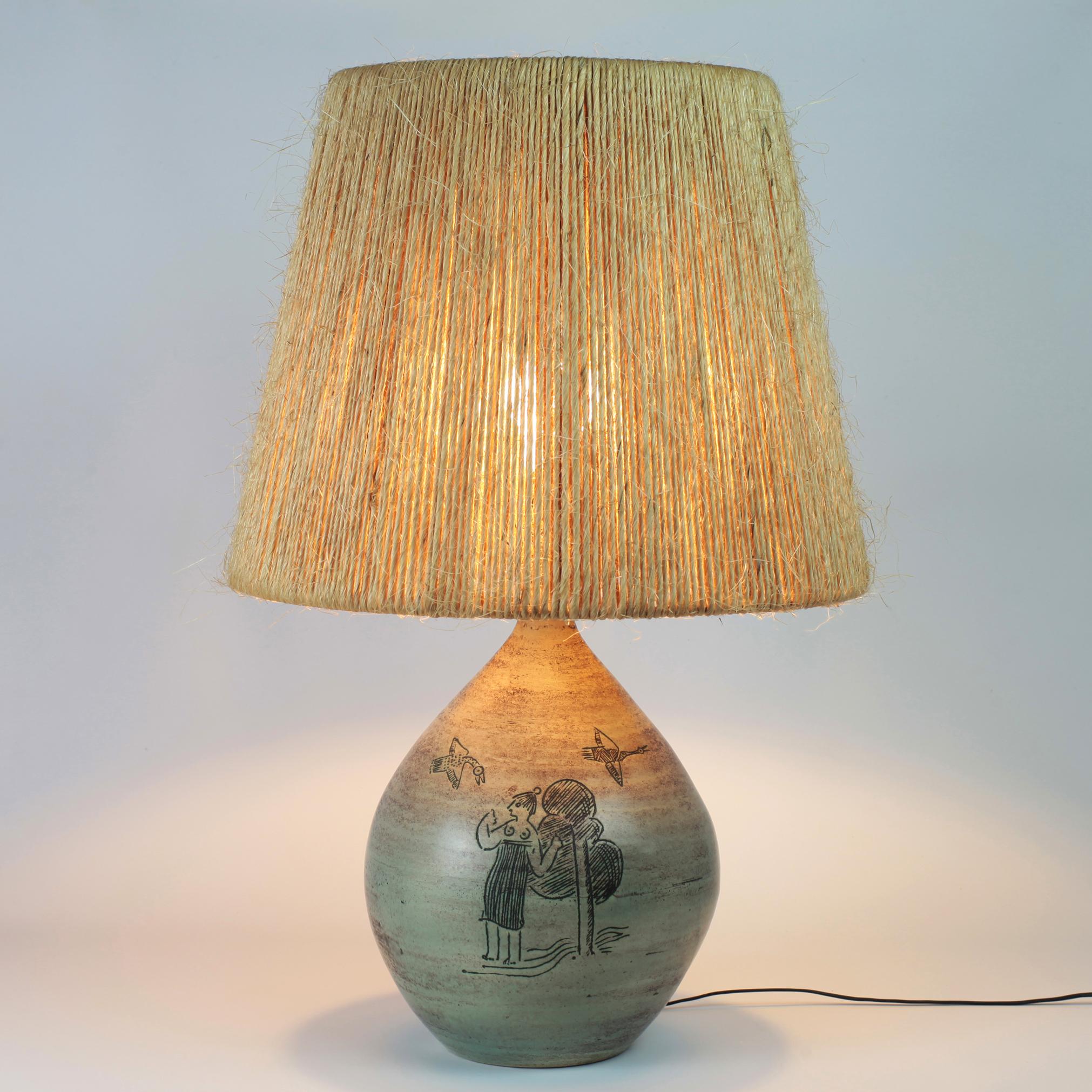 Ceramic table lamp by Jacques Blin with sgraffito decoration.
New original rope shade
Signed.
Measures: Total height with shade 63 cm. Height of the ceramic only 37 cm.
B22 socket.