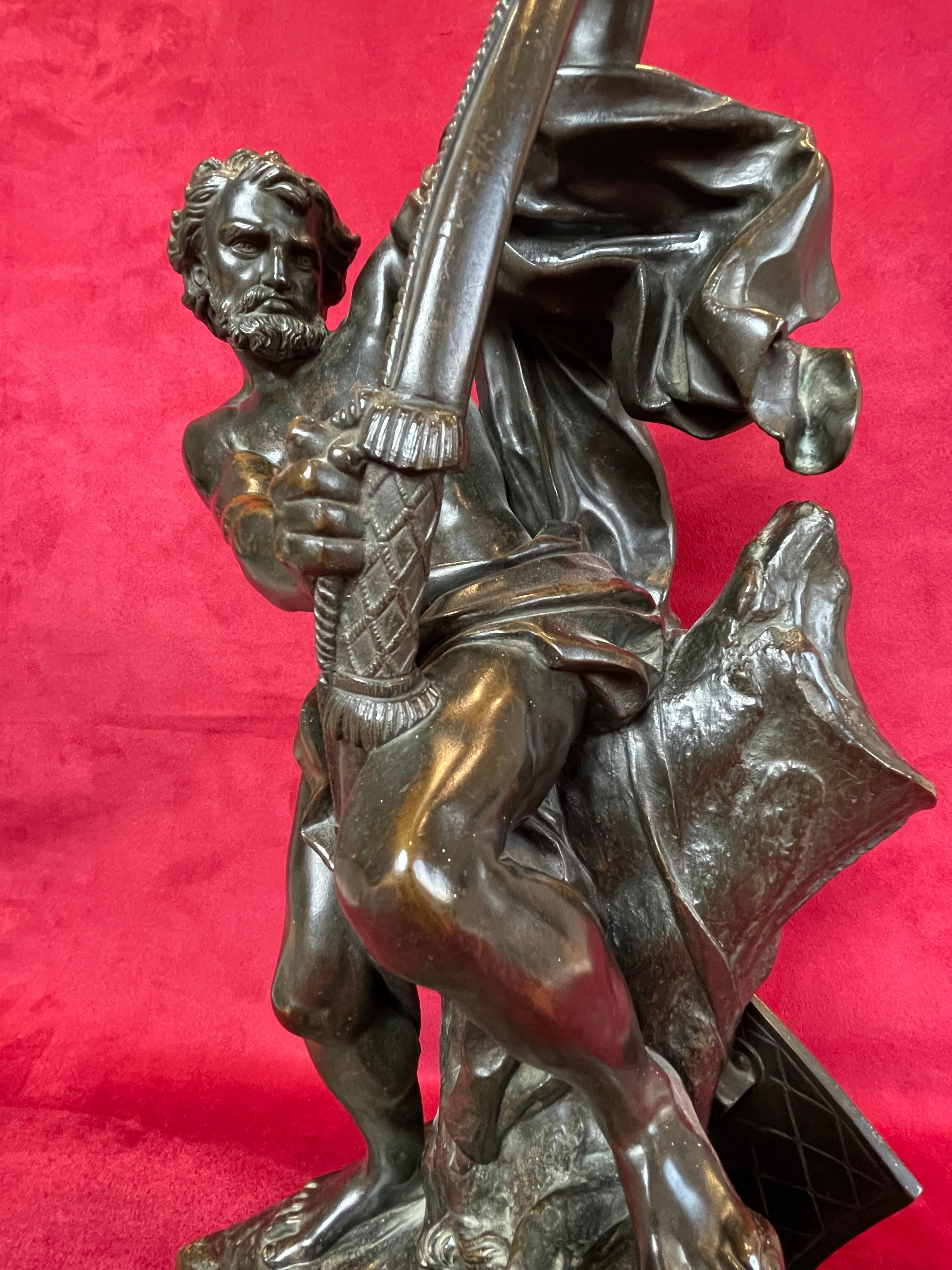 Bronze à patine brune représentant Ulysse tendant son arc, dont Pénélope, son épouse, sera le prix. Ce Bronze date du 19ème siècle, il s'agit d'un modèle d'après Jacques Bousseau, sculpteur français. En France et en Espagne, il portera le titre de