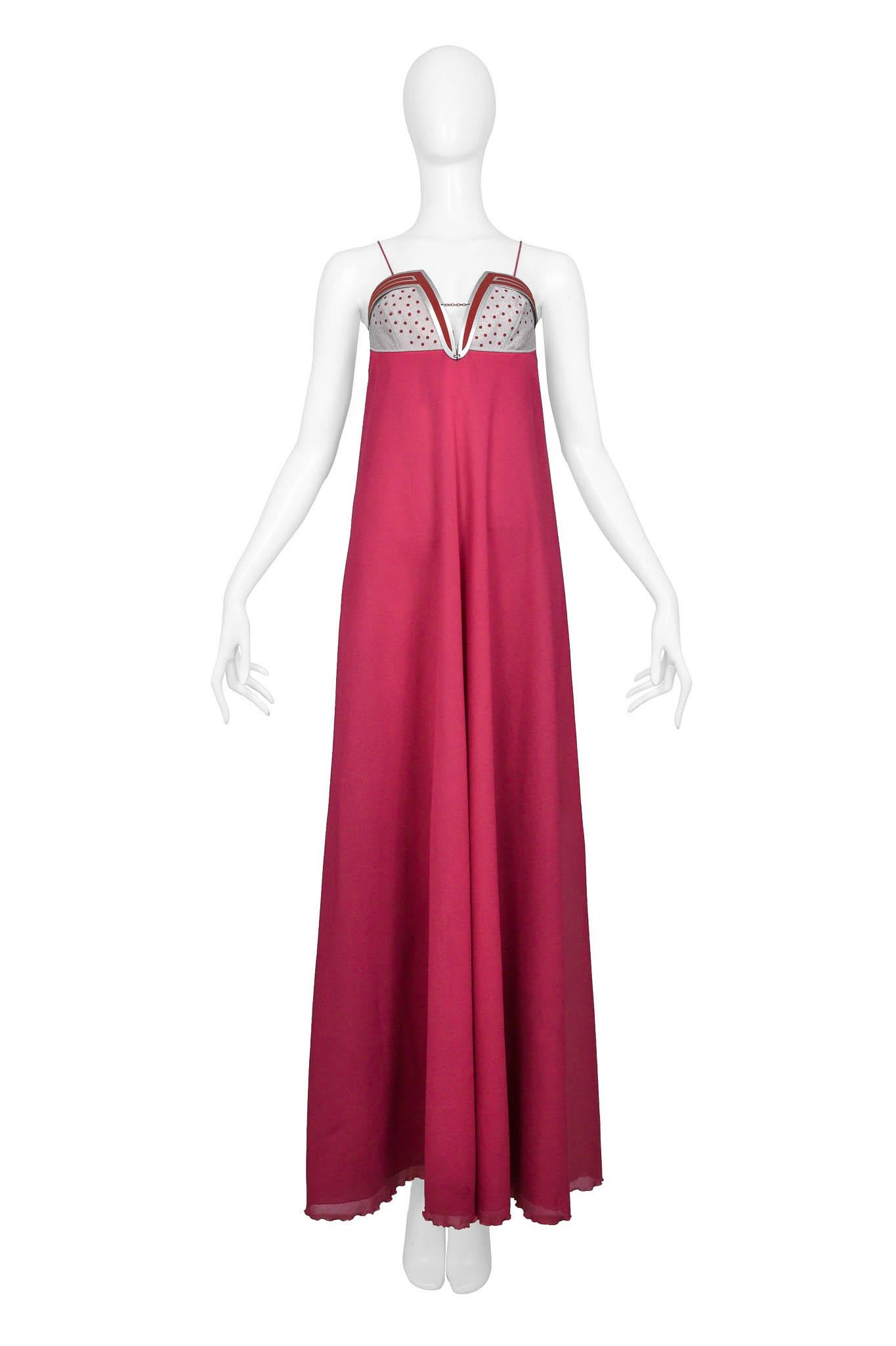 Resurrection Vintage is excited to offer a vintage Jacques Cassia pink gown featuring metal detailing, skinny straps with chain links, and a covered back zipper.

Jacques Cassia
Size: Small
Cotton
Excellent Vintage Condition
Authenticity Guaranteed