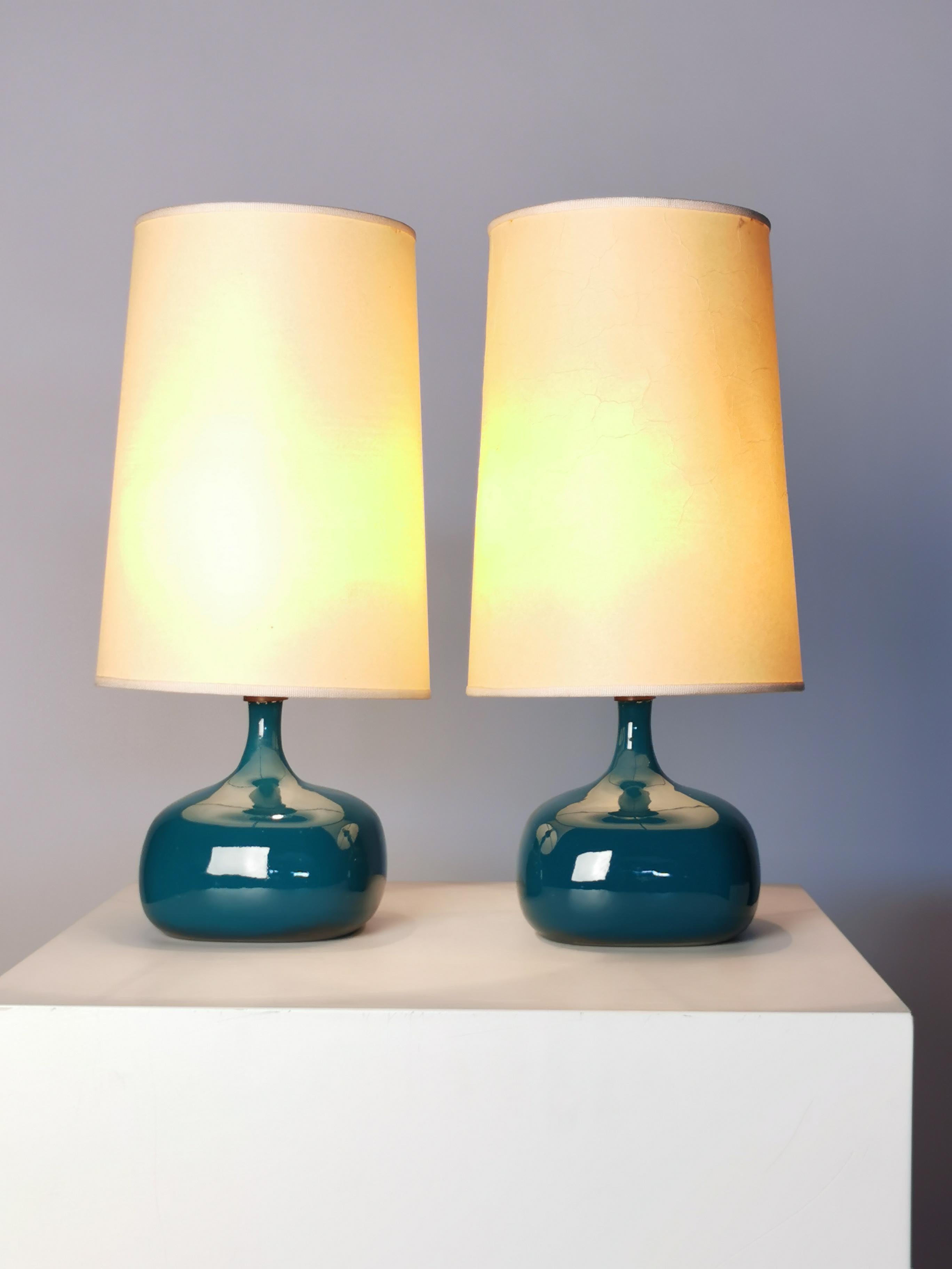 Rare pair of table-lamps by French ceramic artists Jacques & Dani Ruelland.
Blue Turquoise enameled glaze, mod. GC3.
France, 1960s, original shades.
Measures: Height of the base 13.5cm, with shade 33cm.