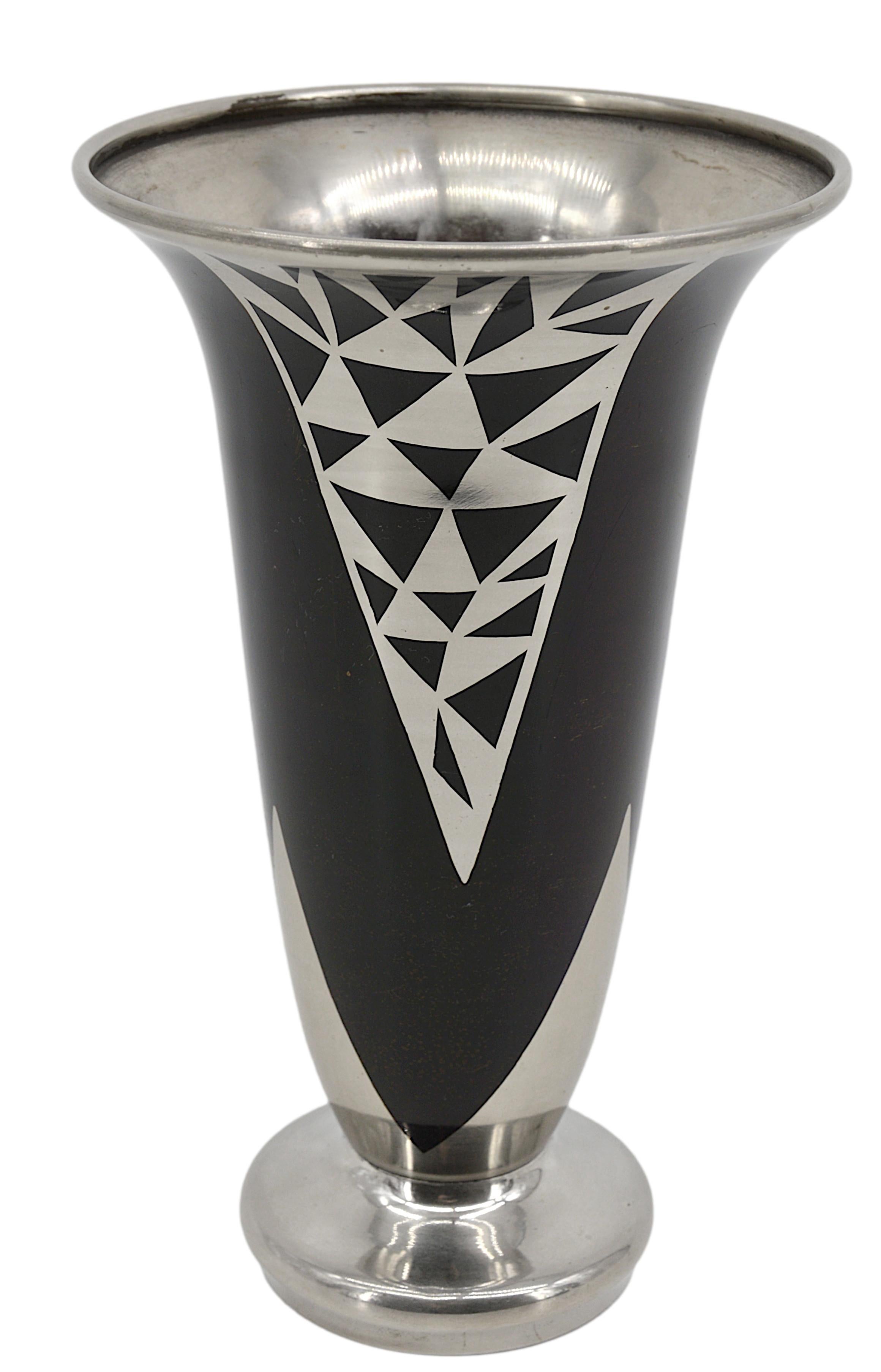 Art Deco brassware vase by Jacques Douau, France, 1937. Geometric silver-plated pattern inside a dark brown patina. Measures: height: 10.2 