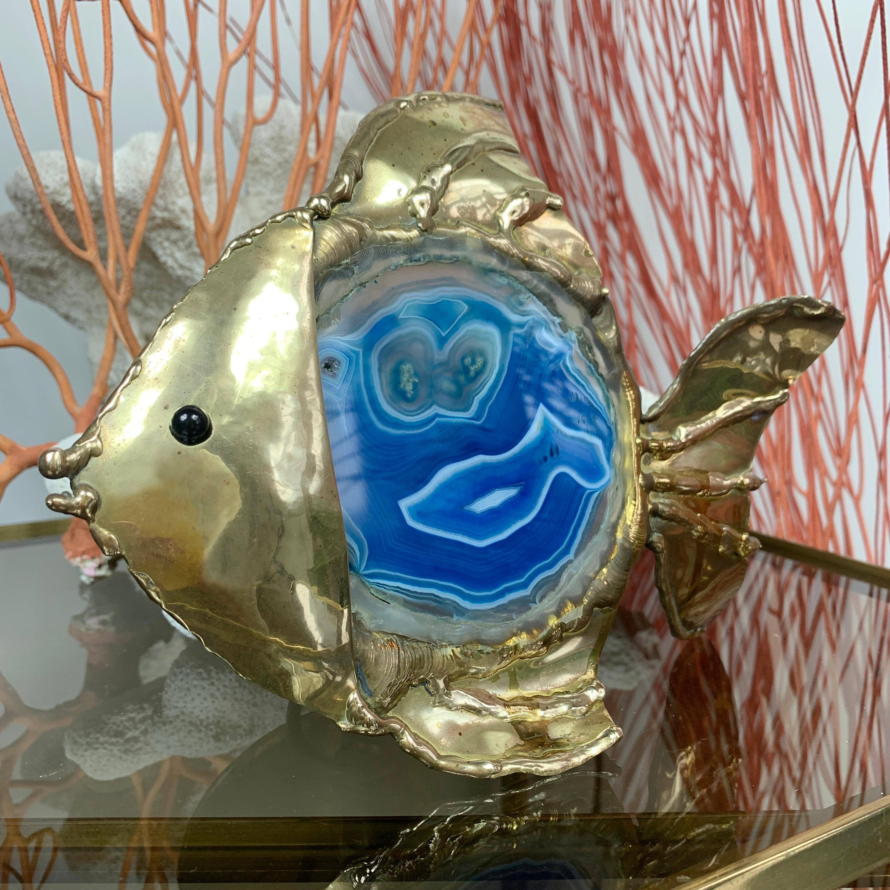 Hand crafted Jacques Duval-Brasseur fish lamp, dating to the 1970's, the exceptional brutalist brass and blue agate piece is a fine example of Brasseur's work. The lamp is an E14 (small screw) bulb fitting.

Duval-Brasseur is a world renowned