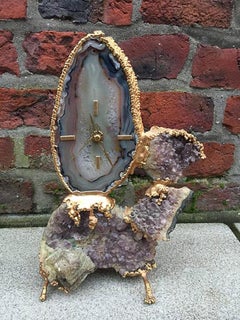 Jacques Duval Brasseur, Tischuhr aus Bronze, Achat und Edelstein