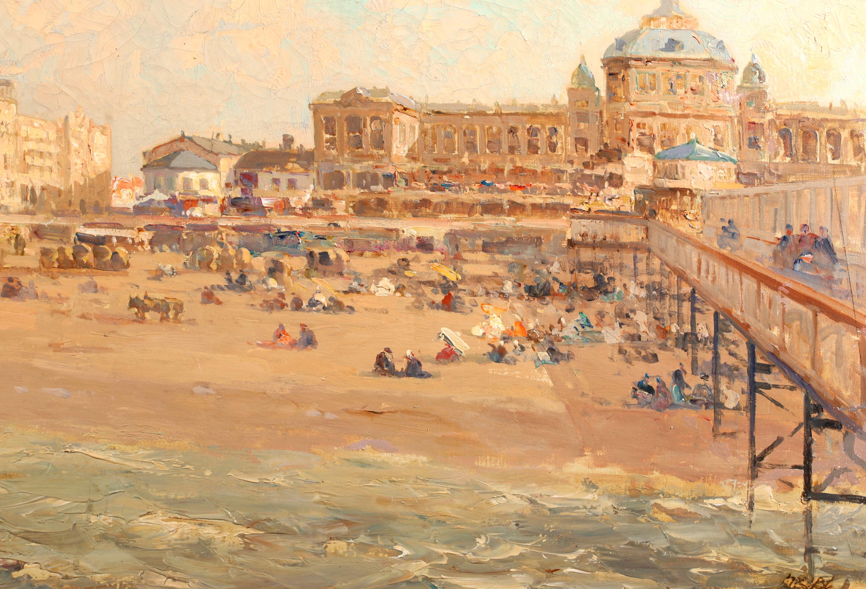 Signed post impressionist oil on canvas landscape  by French painter Jacques-Emile Blanche. The work depicts crowds of people enjoying a day at Brighton beach on the south coast of England. Bathers are dotted across the sandy beach with the pier on