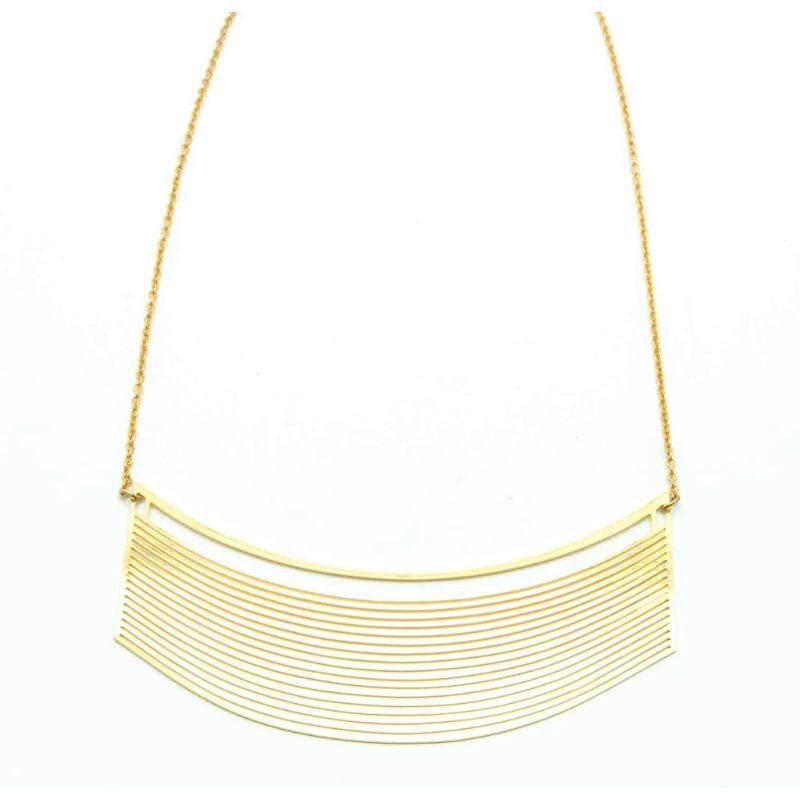 Simplicity, simply beautiful made for Jacques Esterel, French couture designer in the 70s. Jacques Esterel designed the wedding dress of Brigitte Bardot in 1959. This geometric necklace is made of gold plated metal.

Signed: JE Paris
Dimensions: 55