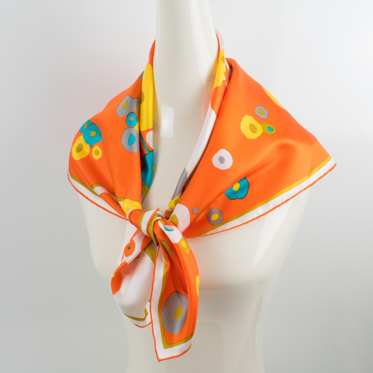 Stunning silk scarf by Jacques Fath Paris in orange and vibrant colors featuring a typical 