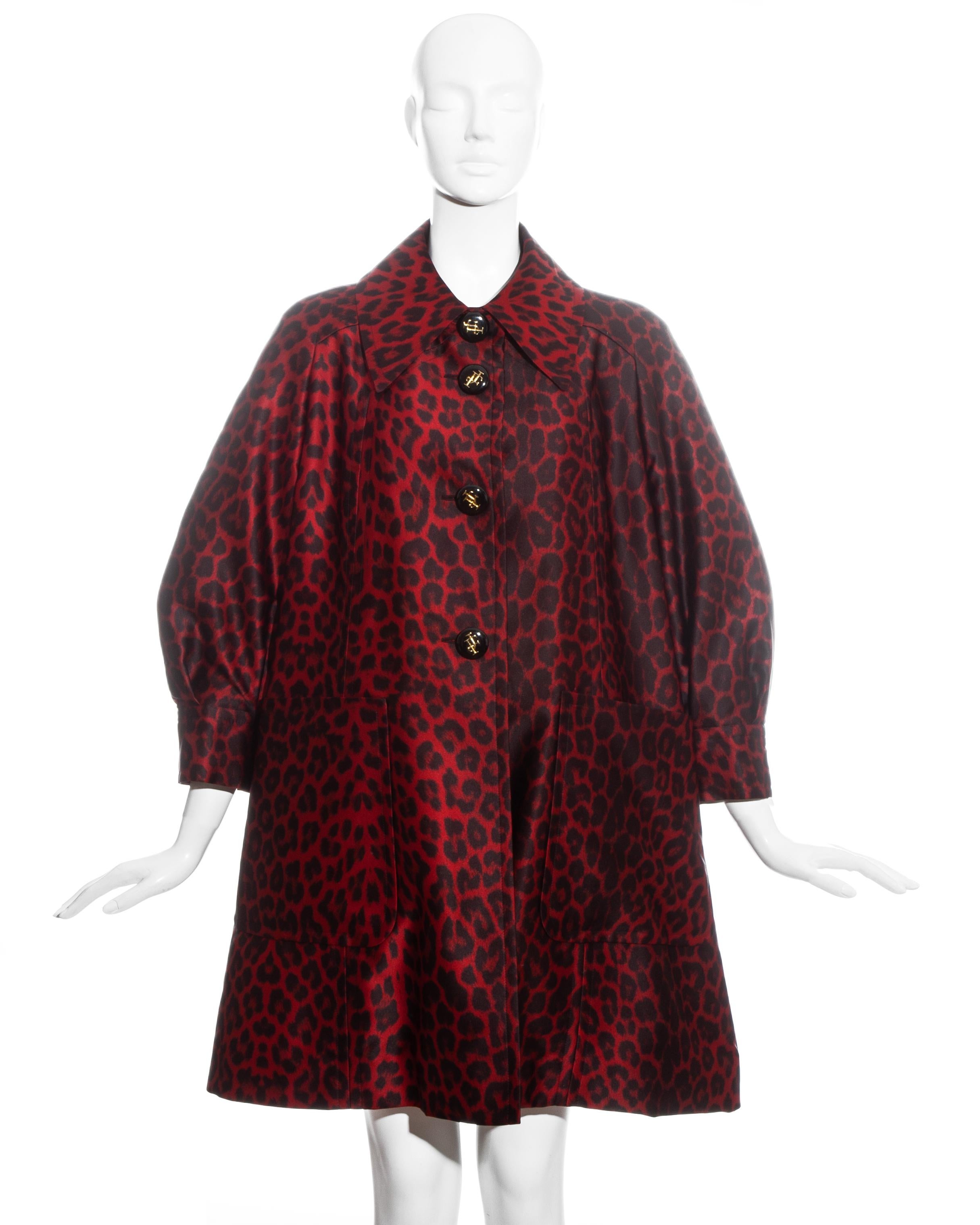 Jacques Fath red leopard print silk evening opera coat with quilted interior and large button fastenings.

Fall-Winter 1992
