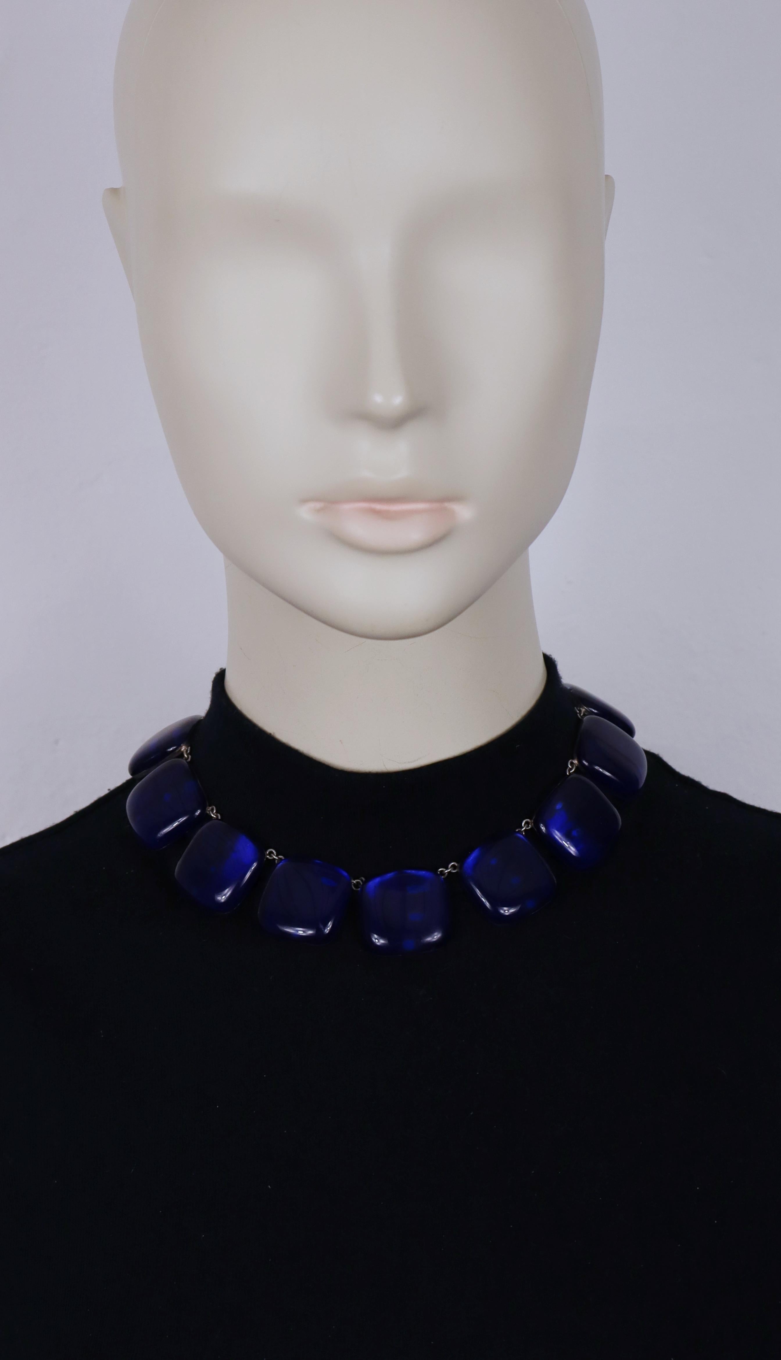 JACQUES GAUTIER vintage silver tone neacklace featuring mirrored sapphire blue glass cabochons.

Hook clasp closure.

Embossed J. GAUTIER.

Indicative measurements : length approx. 36 cm (14.17 inches) / width approx. 2.5 cm (0.98 inch).

Materials
