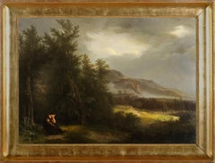 Trauernde Frau in einer stürmischen Berglandschaft
