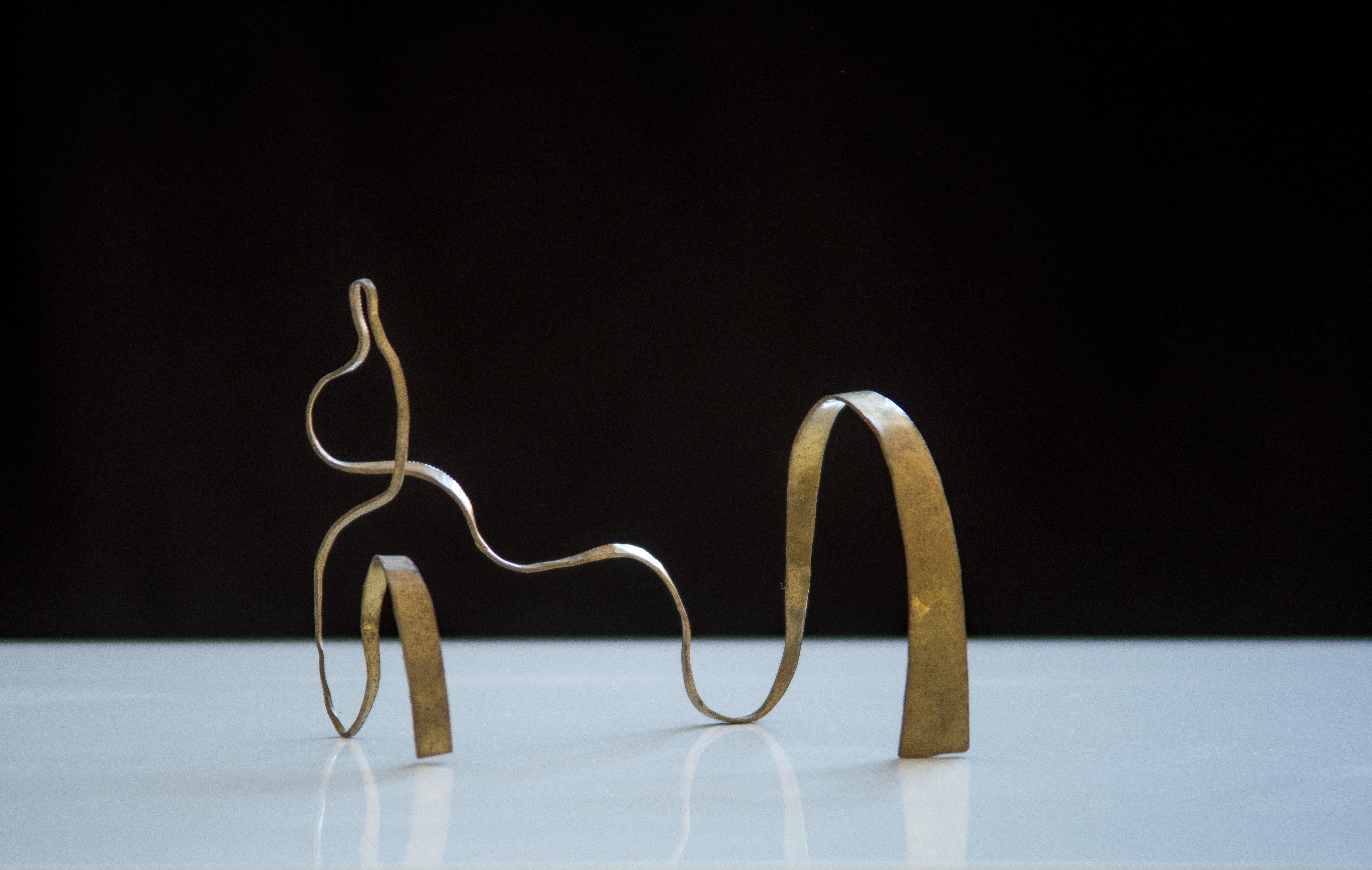 A small scale sculpture formed with a ribbon of  hand-hammered brass. 
Unique piece by French sculptor Jacques Jarrige from a body of work created in 2017 for
Valerie Goodman Gallery. 
