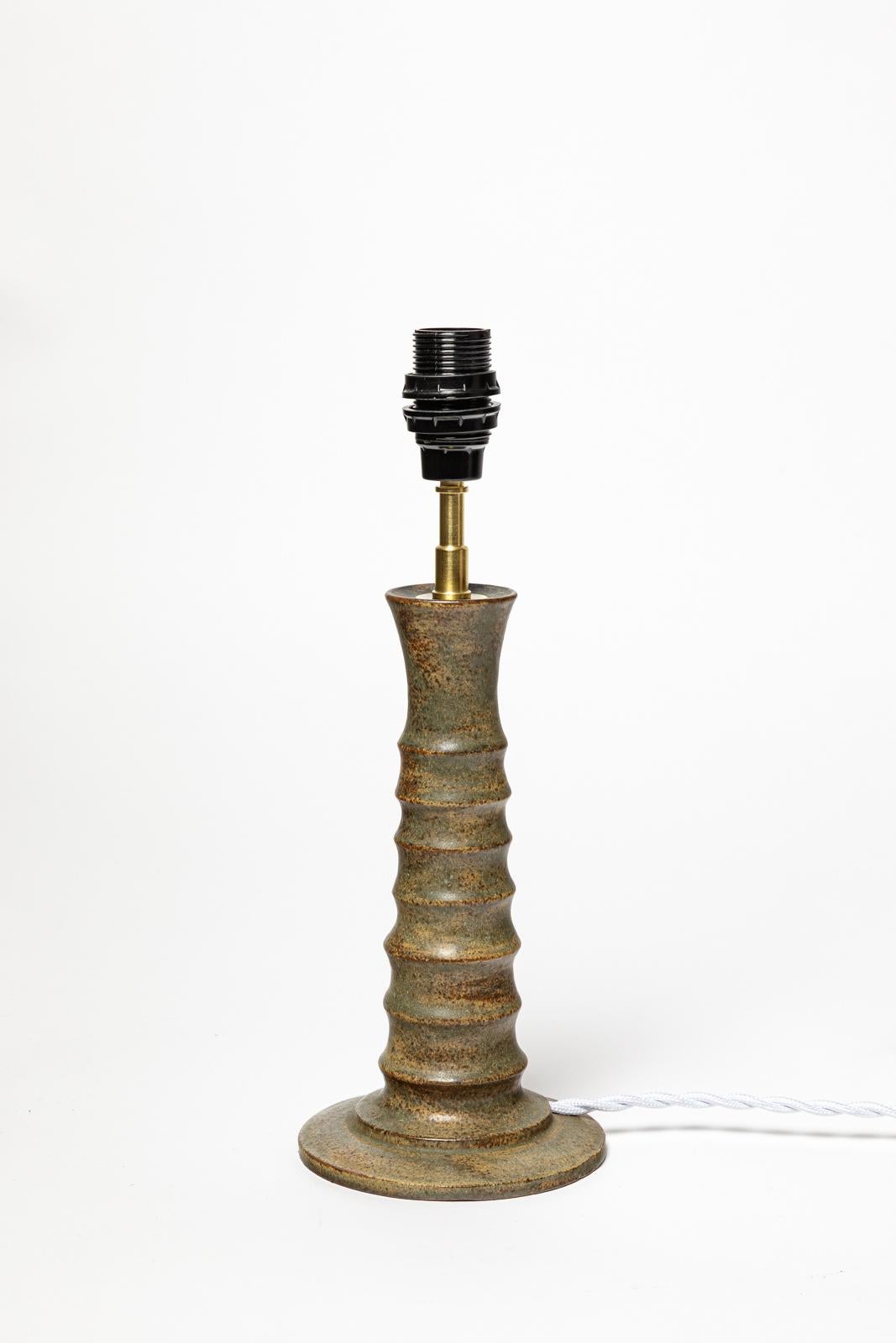 Jacques Lacheny

20th century design grey stoneware ceramic table lamp by Jacques Lacheny

Signed under the base

original perfect condition

Ceramic height 21 cm
Large 12 cm
Total height with electrical system 31 cm
