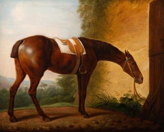 A saddled hunter tethered to a stable door, a landscape beyond