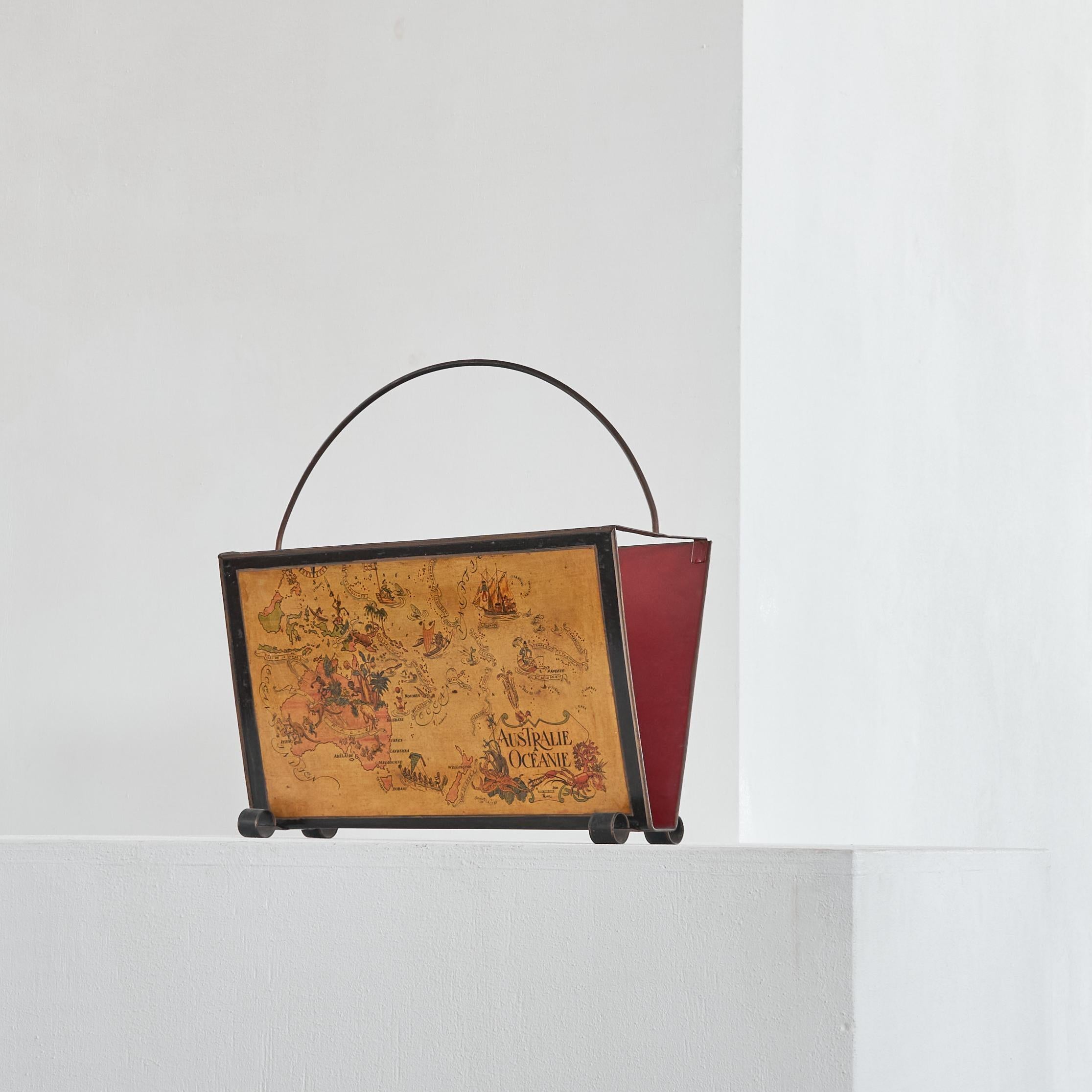 Jacques Liozu Magazine Rack with Whimsical Silk Screened Maps, Paris, France, 1950s.

This is a very special and rare 1950s magazine rack in silk-screened metal with whimsical maps of Australia, Oceania and Asia made by French artist Jacques Liozu.