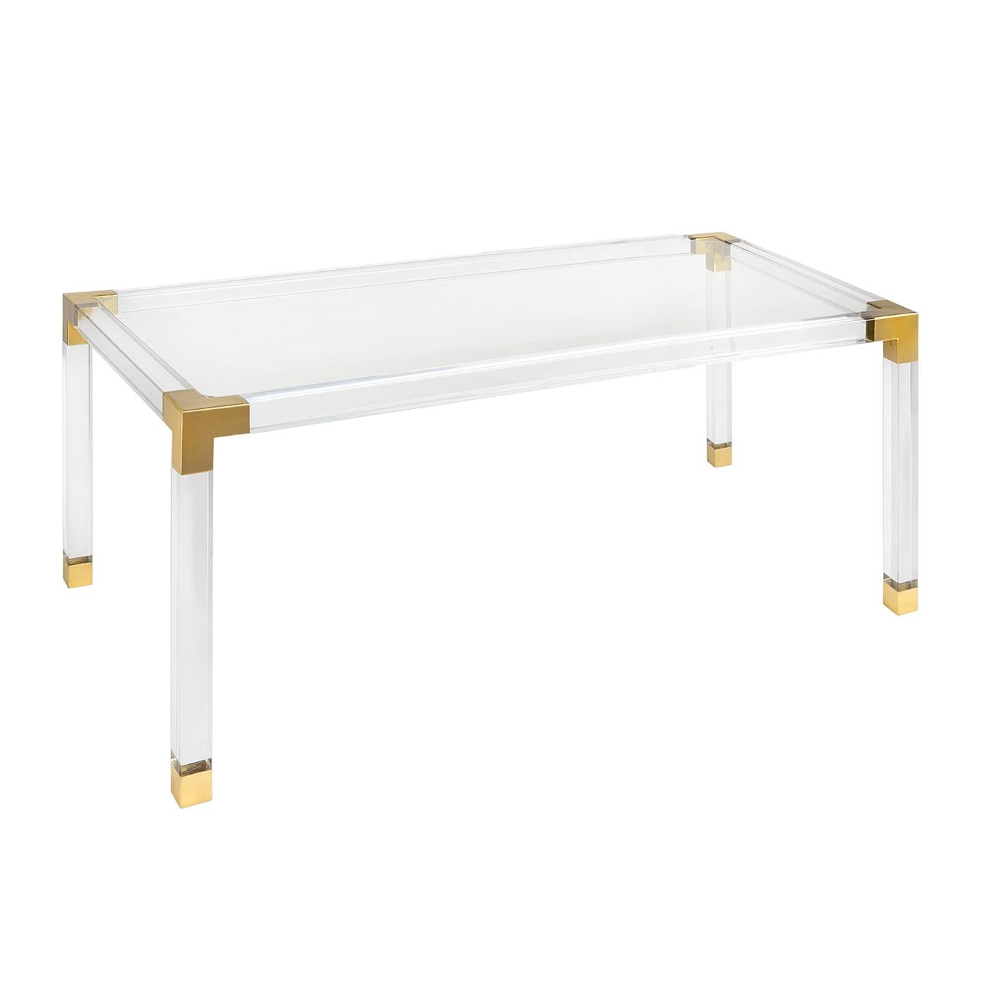 Clearly cool. Our Jacques collection is the perfect blend of simplicity and glamour, modern and traditional. Featuring luxe clear acrylic with brushed brass corners, our Jacques dining table seats up to six for a chic dining experience. Swag an