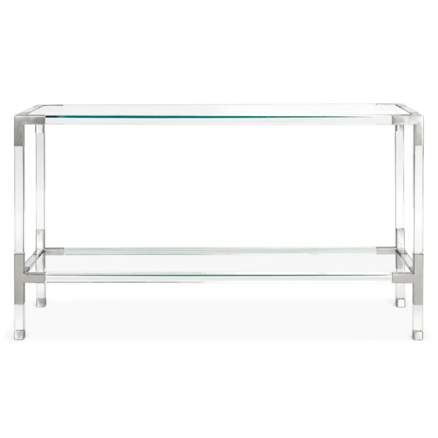 Clearly cool. Our Jacques collection is the perfect blend of simplicity and glamour, modern and traditional, in crystal clear Lucite with polished nickel corners. Fitted with a low glass shelf for baubles or books, our Jacques console works